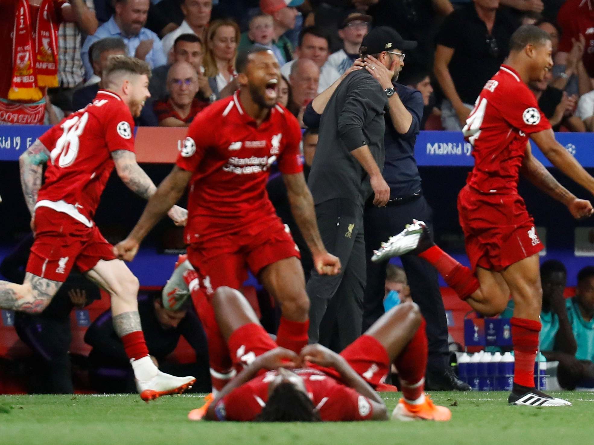 Liverpool celebrate upon the full-time whistle