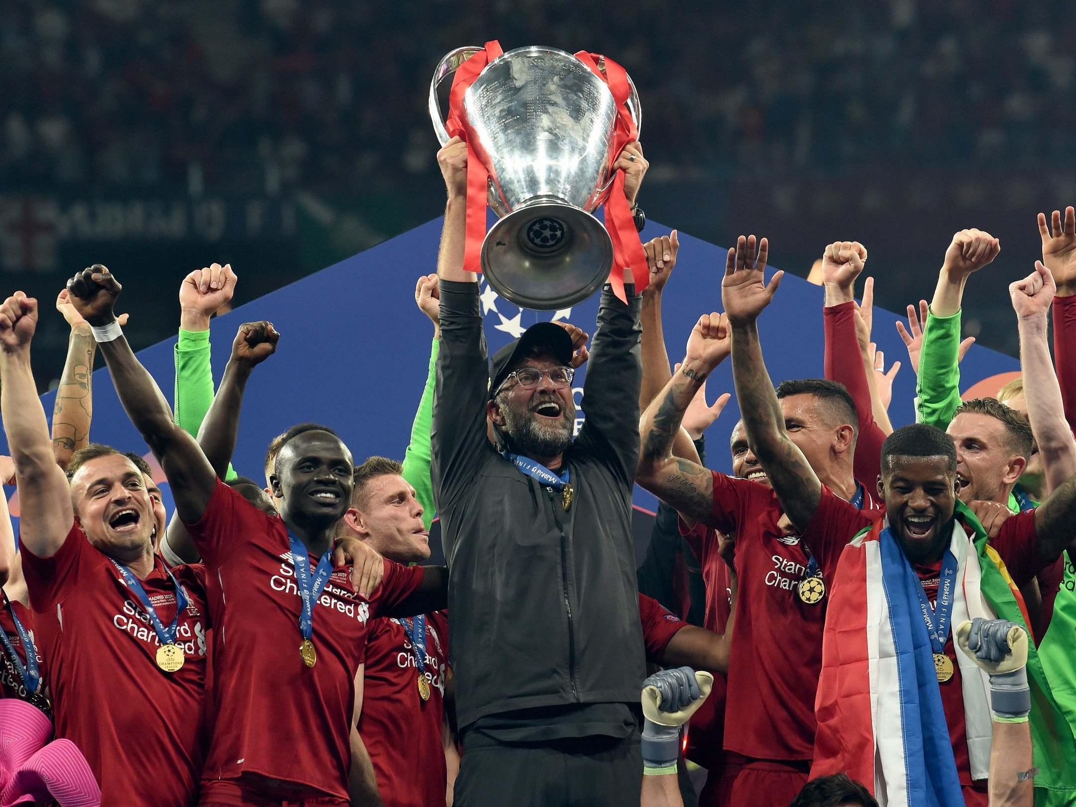 Jurgen Klopp lifts the Champions League trophy for the first time in his career