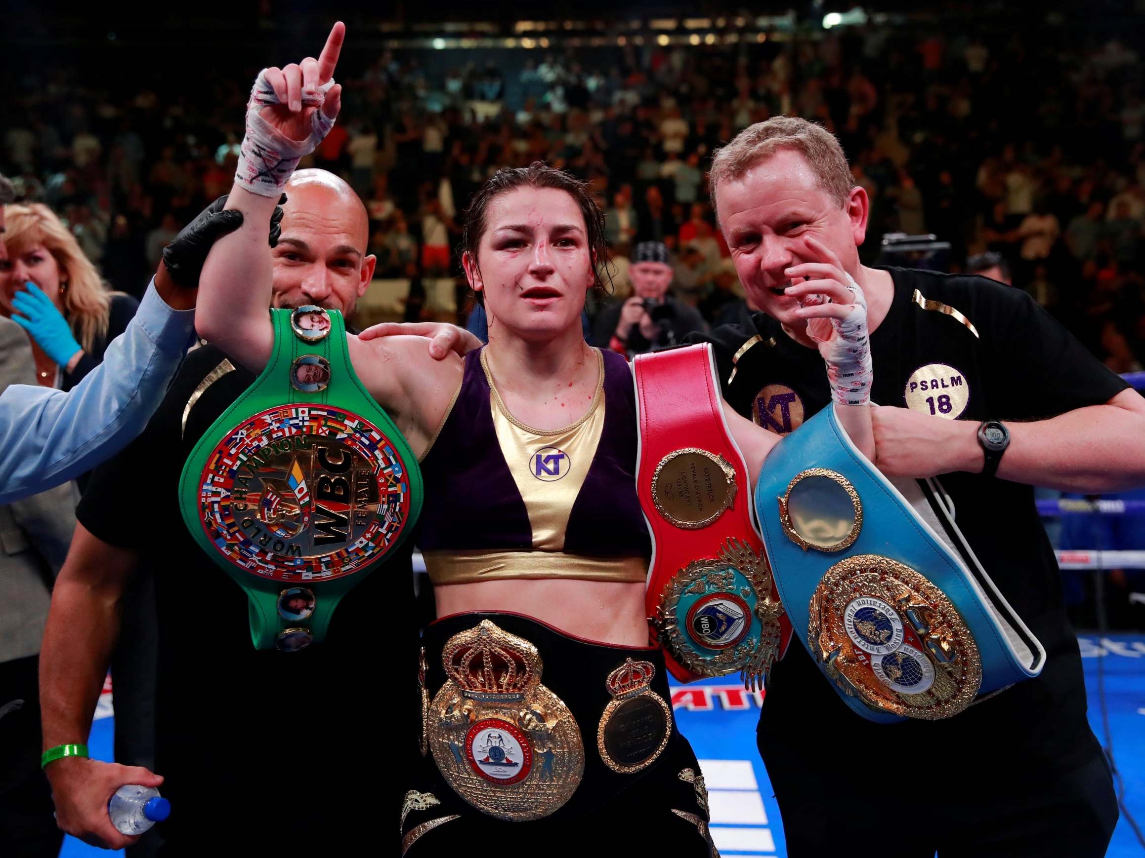 Katie Taylor celebrates becoming undisputed lightweight champion