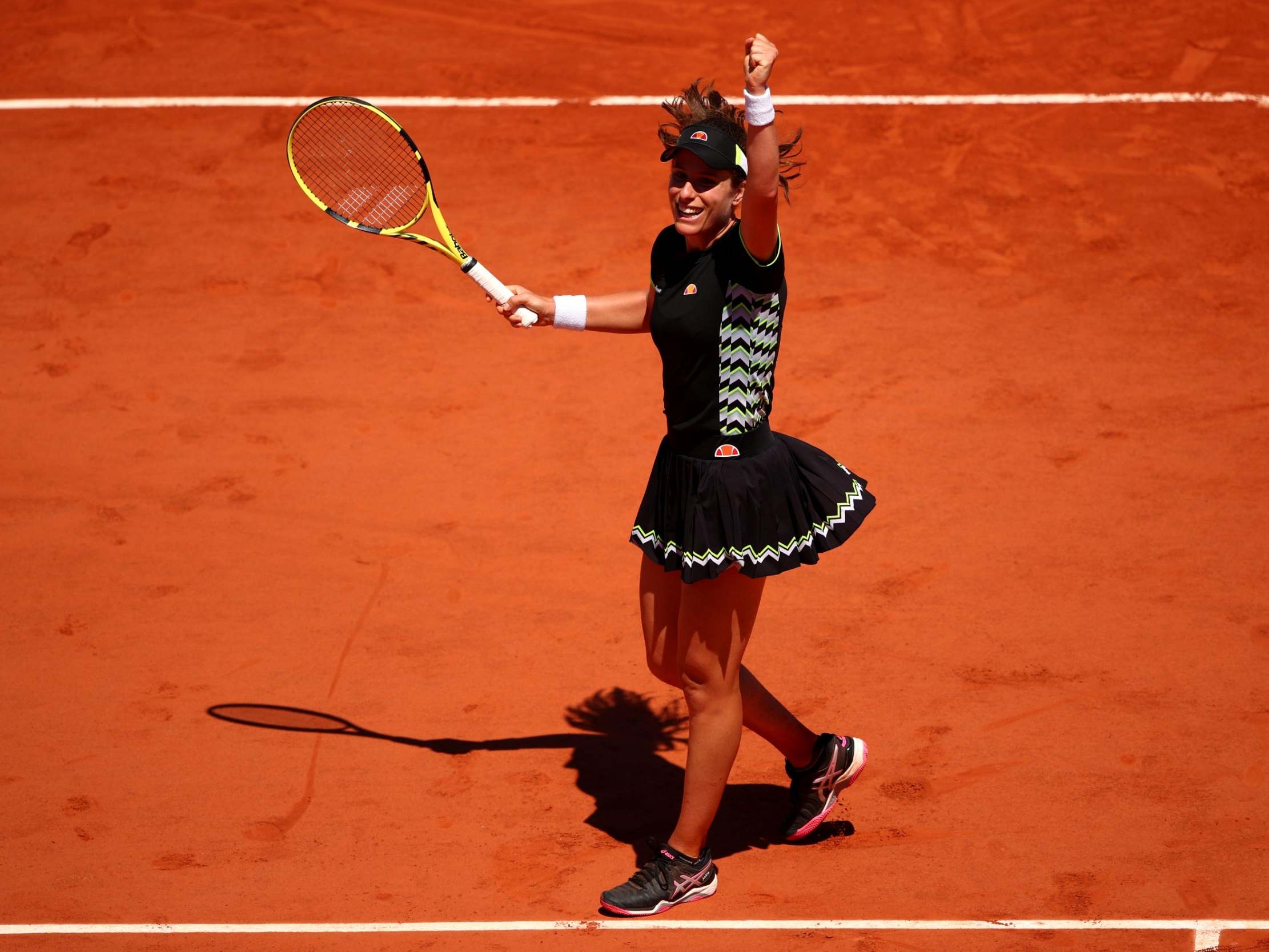 Johanna Konta celebrates reaching the last eight