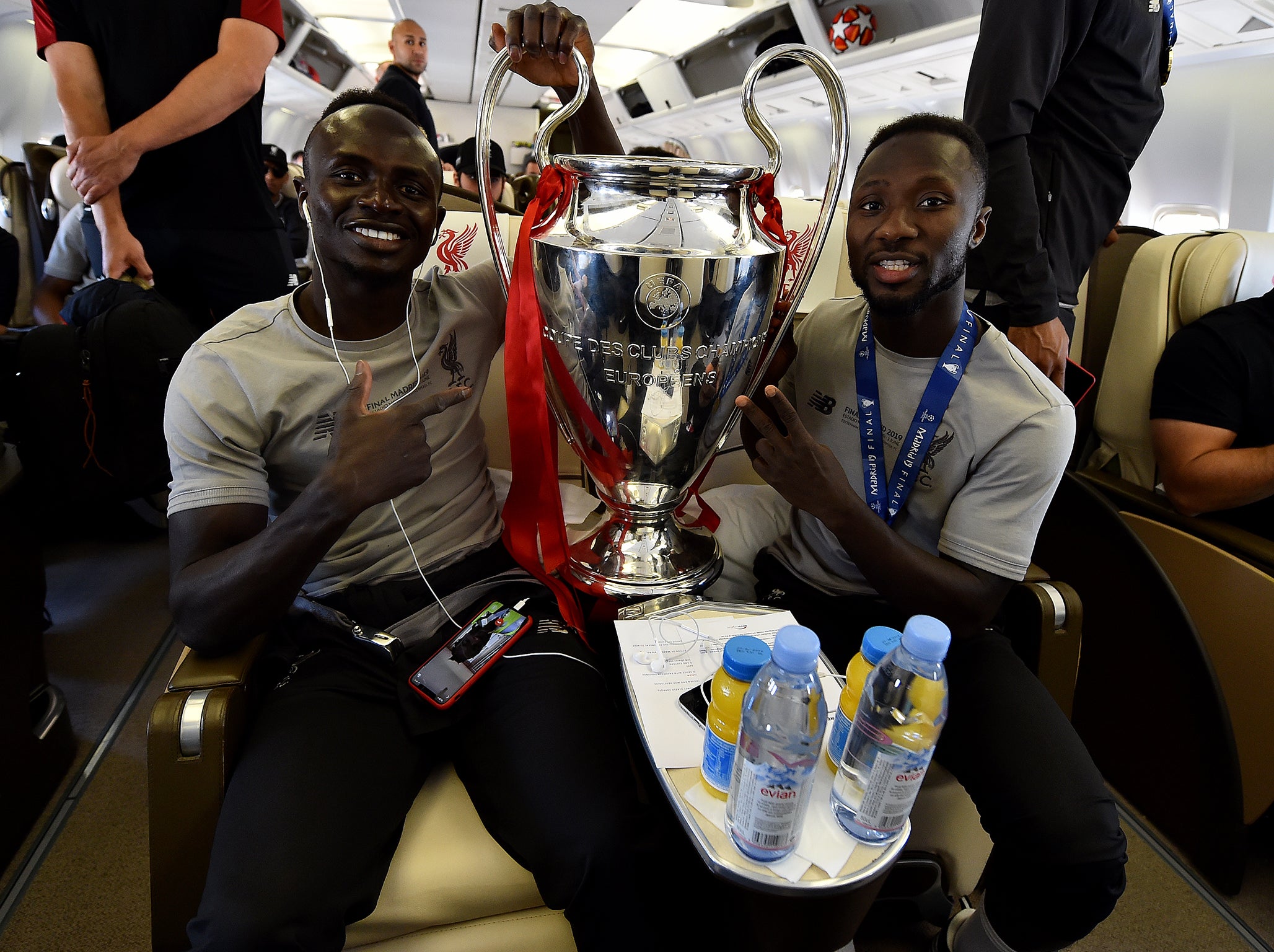 Sadio Mane and Naby Keita with the trophy