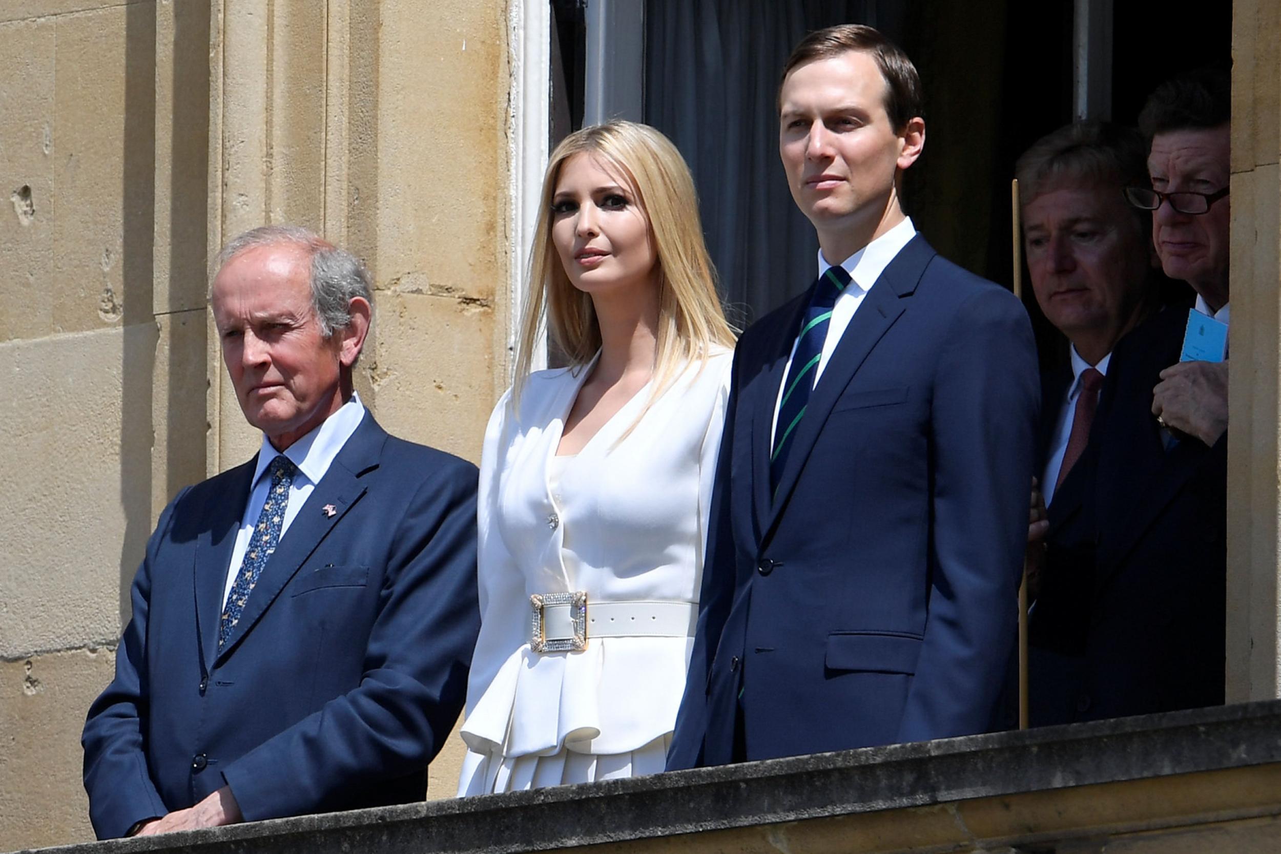 Ivanka Trump (C) and her husband special advisor to the US president Jared Kushner (R) watch during a welcome ceremony at Buckingham Palace in central London on June 3, 2019.