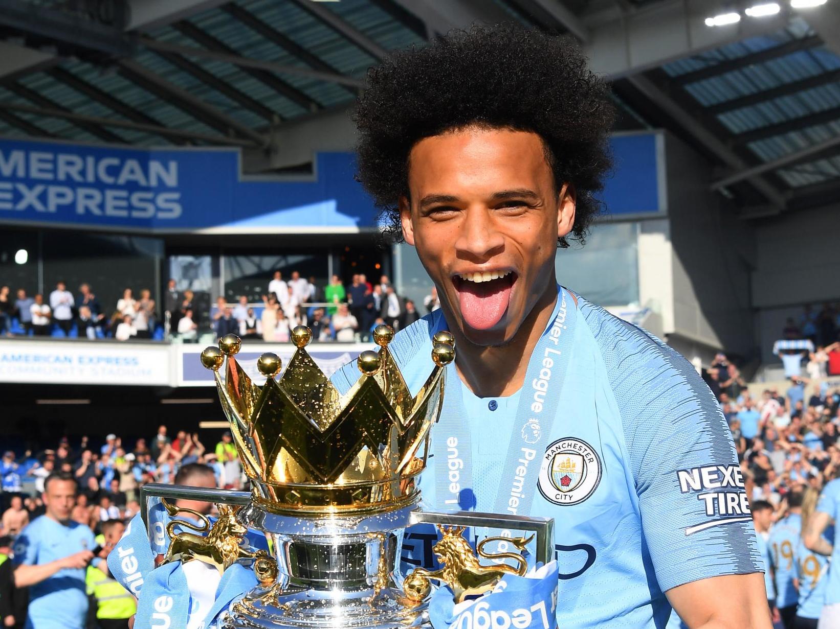 Manchester City winger Leroy Sané with the Premier League trophy