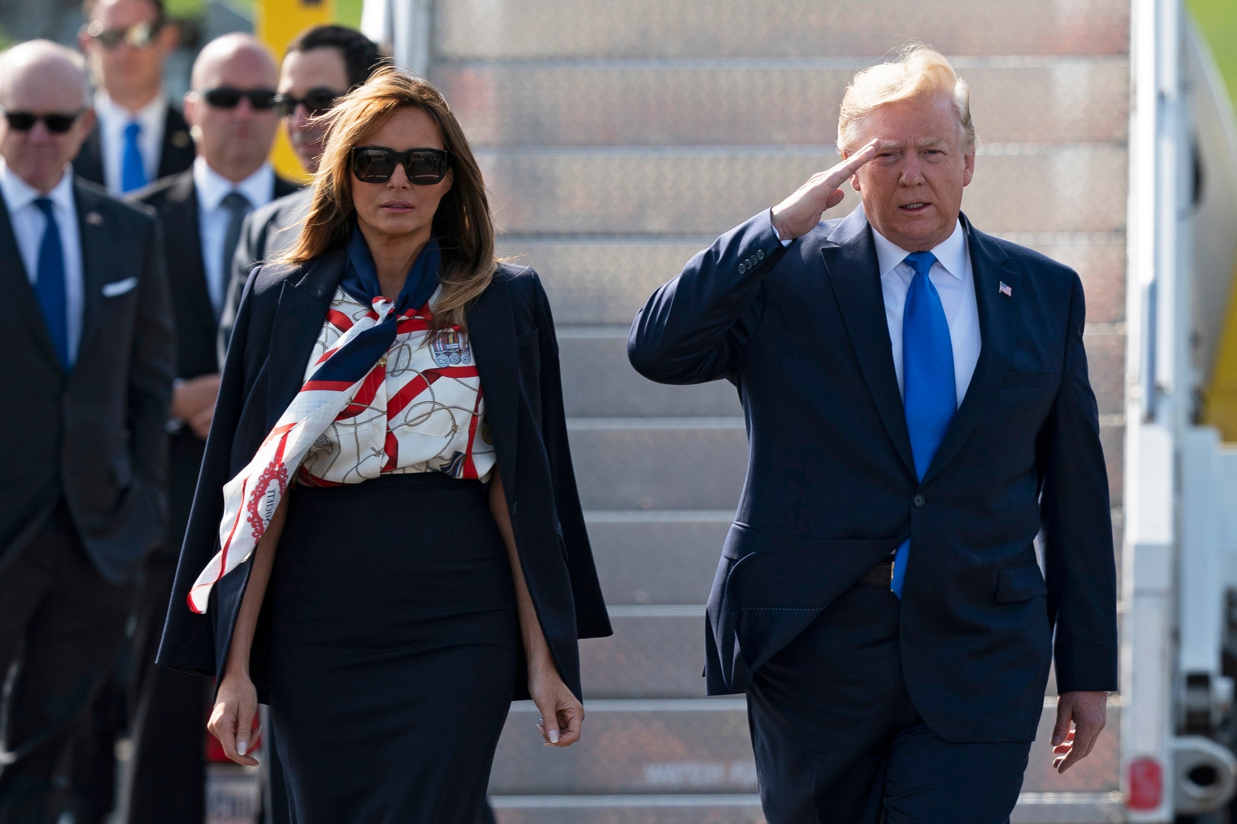 Melania accessorised her post-flight look with a pair of oversized sunglasses.