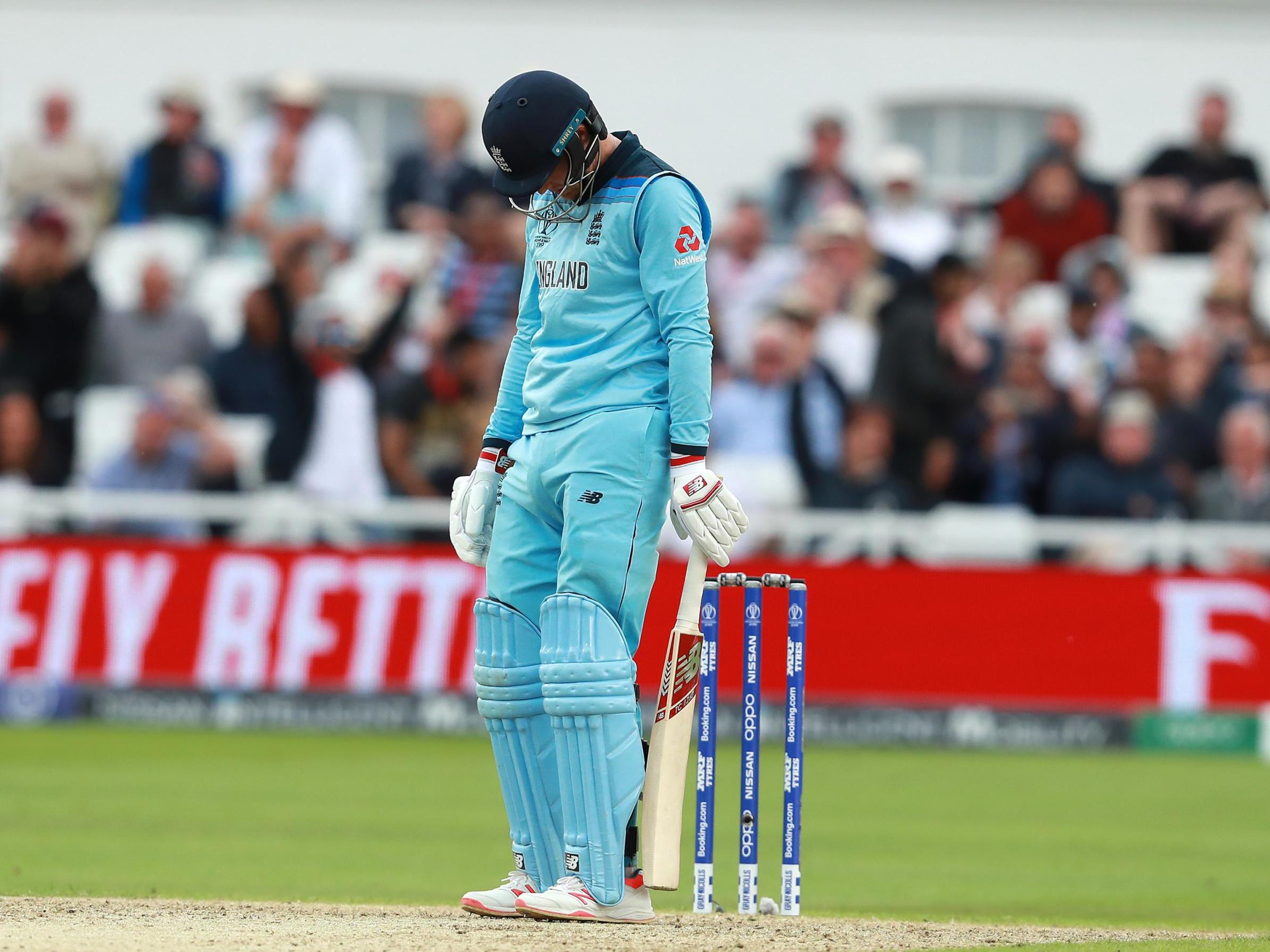 Joe Root looks dejected after being caught