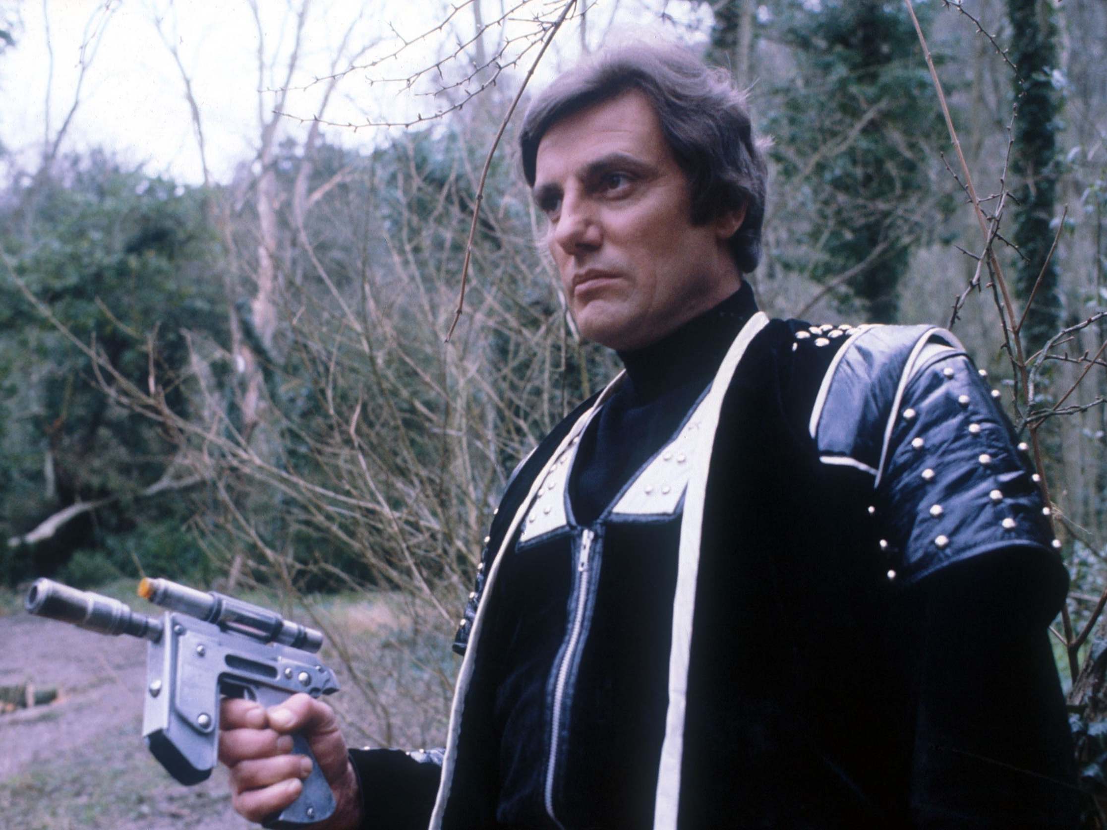 Surrey-born actor Paul Darrow appearing as Kerr Avon in 70s and 80s BBC sci-fi series Blake's 7.
