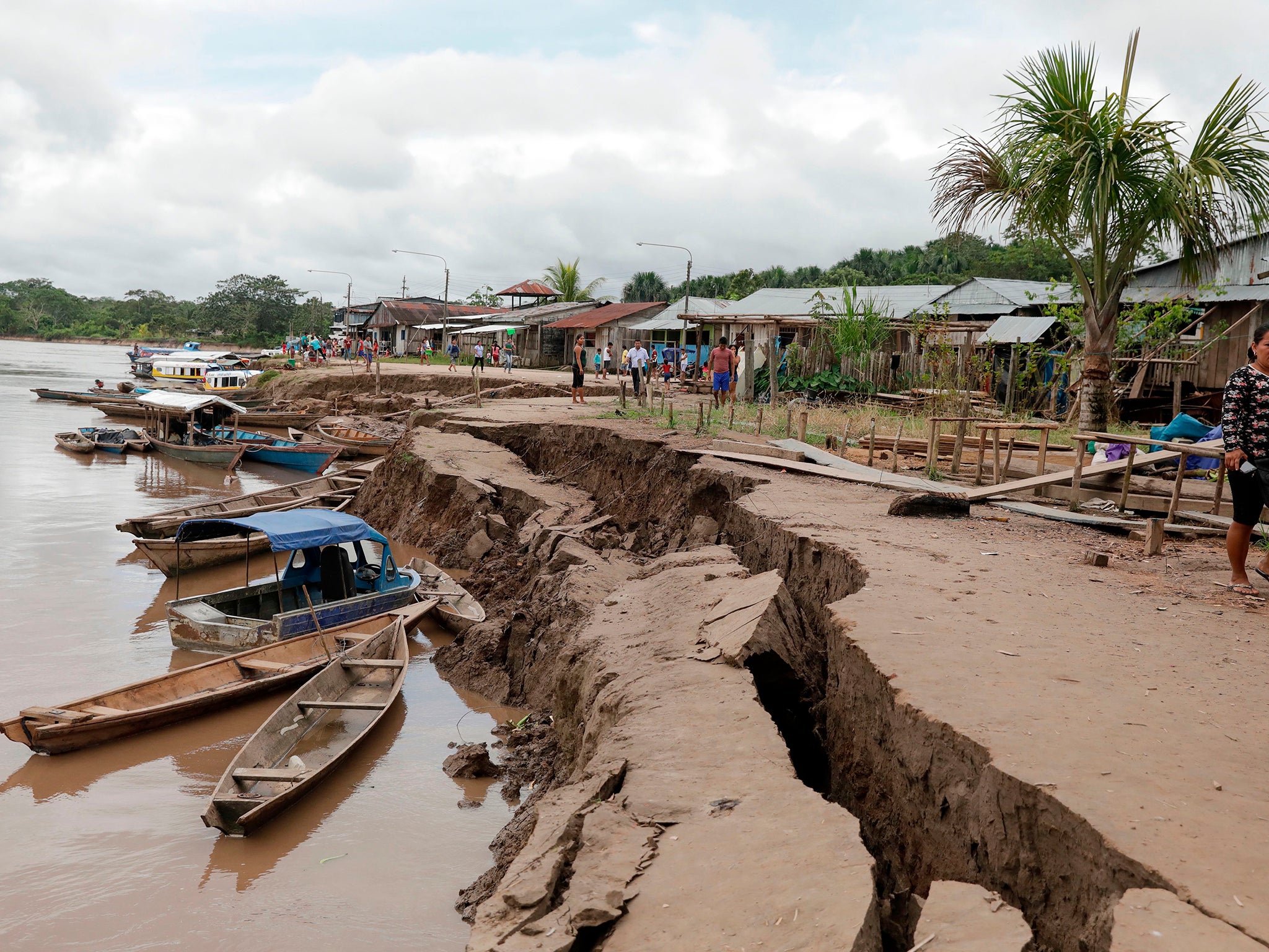 A crack on the ground is caused by a quake in Puerto Santa Gema, on the outskirts of Yurimaguas, in the Amazon region (Getty)