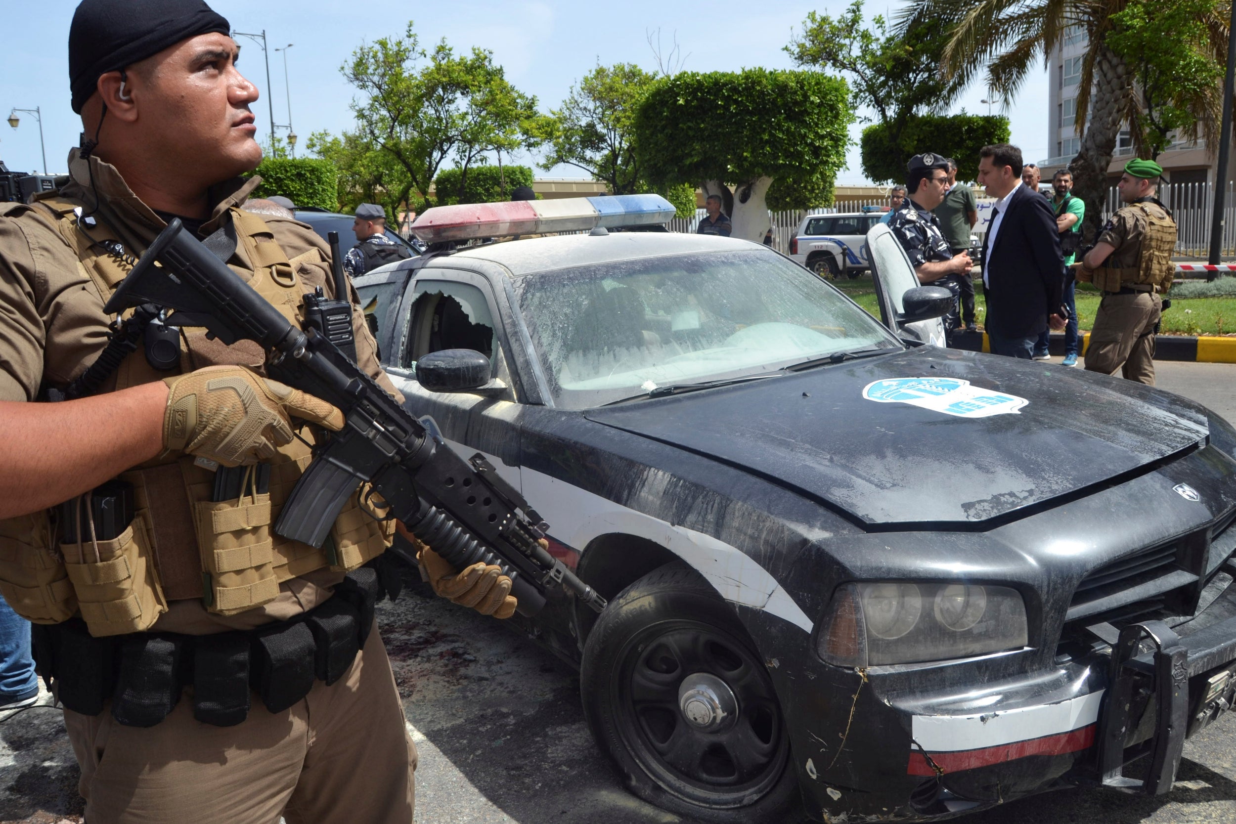 Lebanese military personnel secure the scene where a militant attacked security forces on Monday night