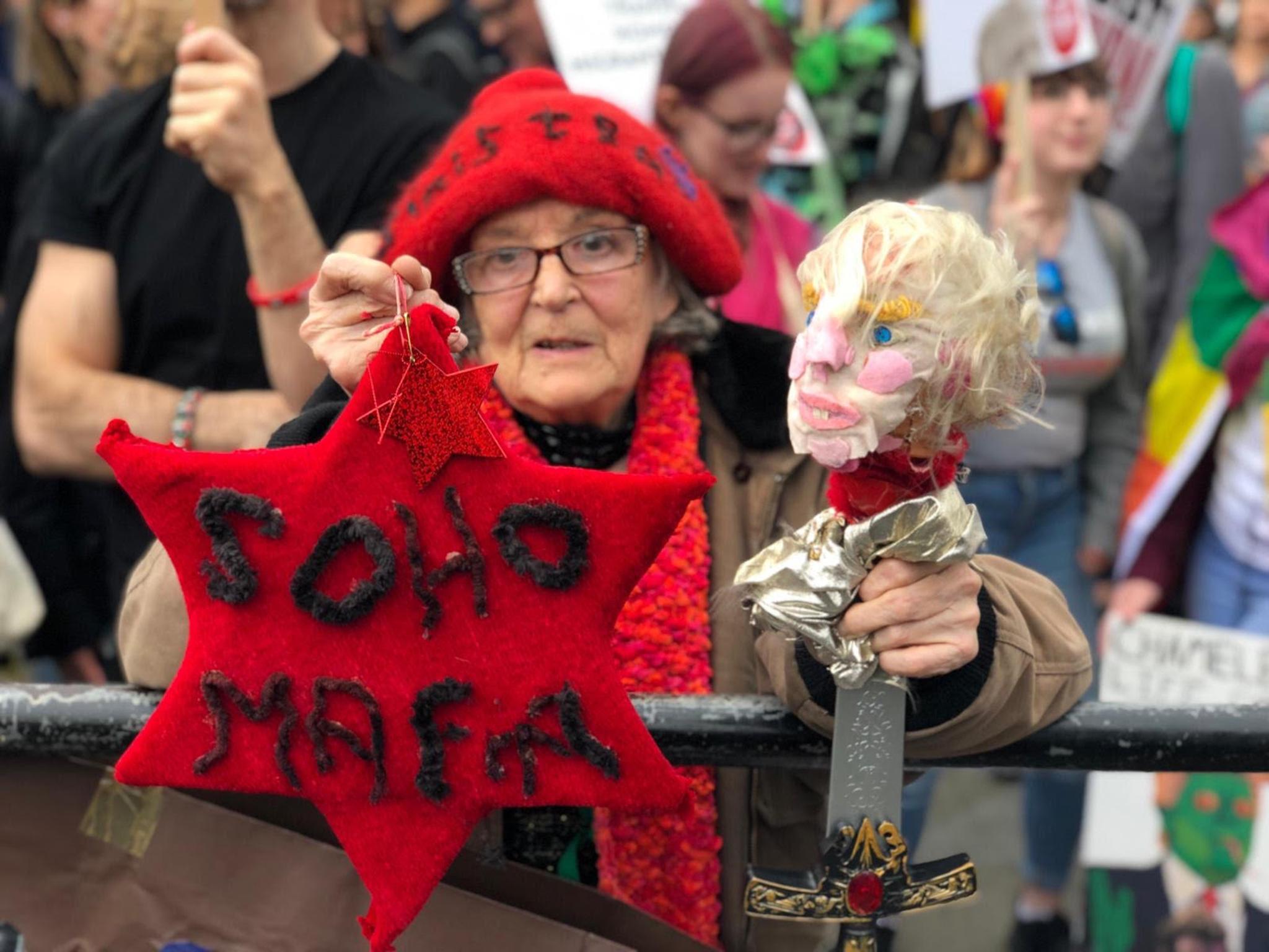 Mary McMillan, who took to the streets with a home made Trump doll (The Independent)