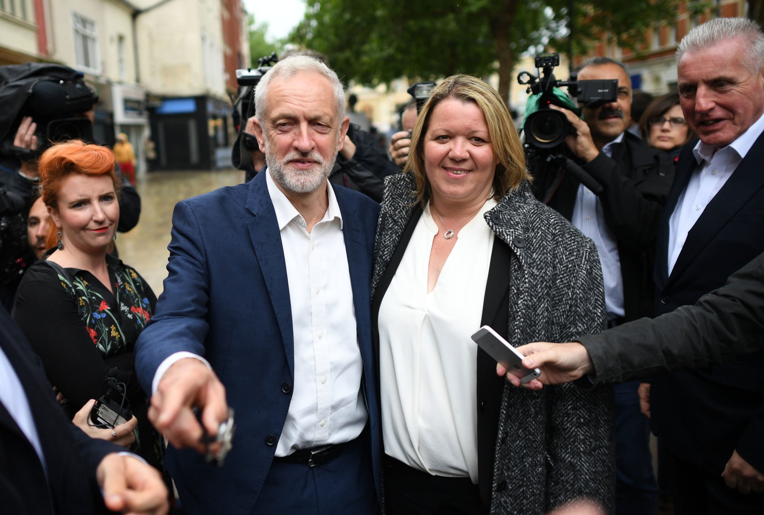 Jeremy Corbyn celebrates with new Labour MP Lisa Forbes in Peterborough