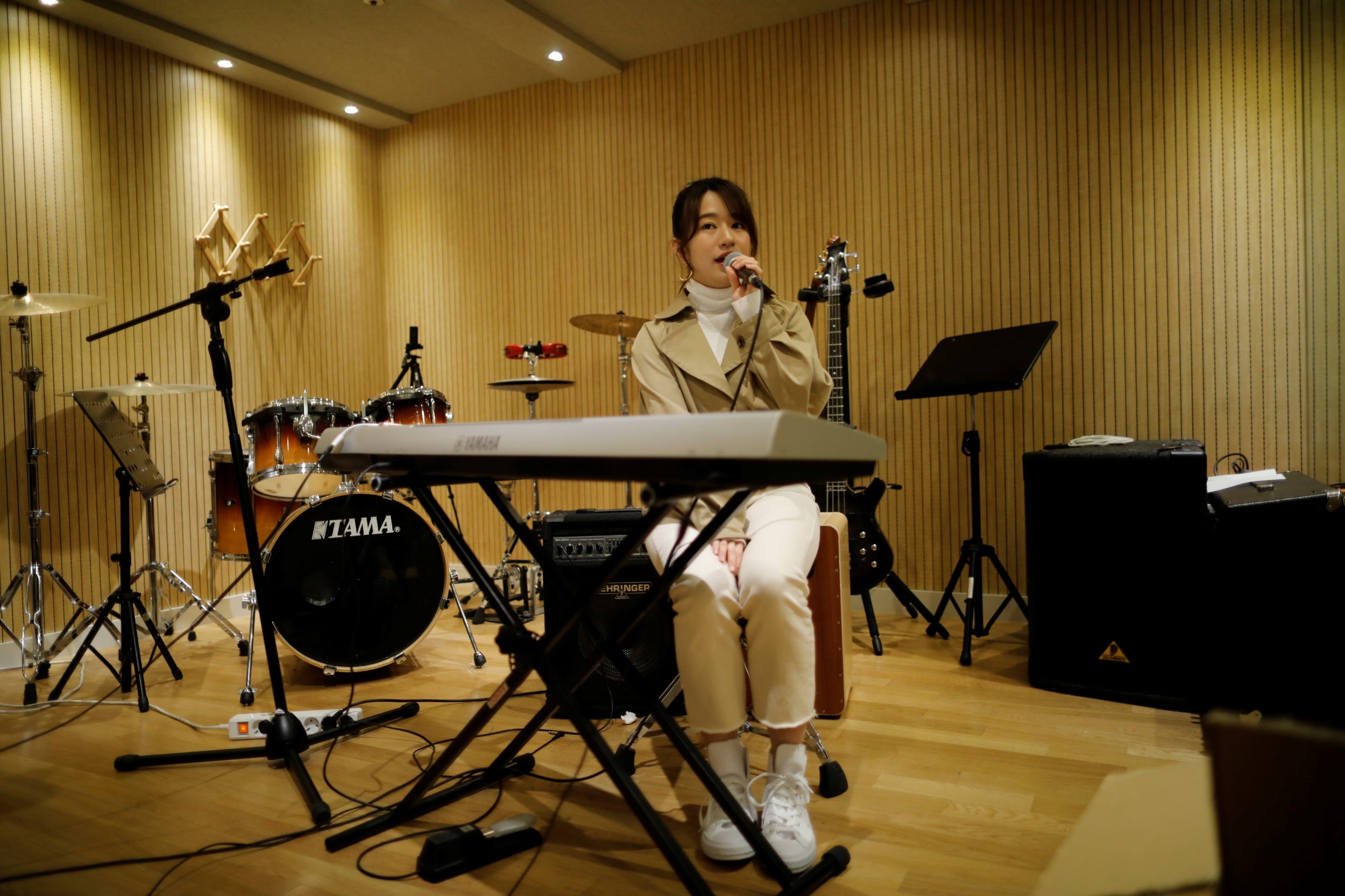 Miyu Takeuchi, a trainee with the K-pop agency Mystic Entertainment, sings during a training session in Seoul. Takeuchi said it wasn't a difficult decision to leave a 10-year career with a top idol band AKB48 back home in Japan to sign with the K-pop agency Mystic Entertainment in March as a trainee. Even with her experience, she has seven hours of vocal training a day and two-hour dance lessons twice a week, plus early morning Korean lessons. She is not allowed to have a boyfriend but she says she has no regrets, despite the fact there is no guarantee she will make it. "I don't know how long my training period will be, but it has to reach a point where my coaches and management company say 'Miyu, you are a professional!'"