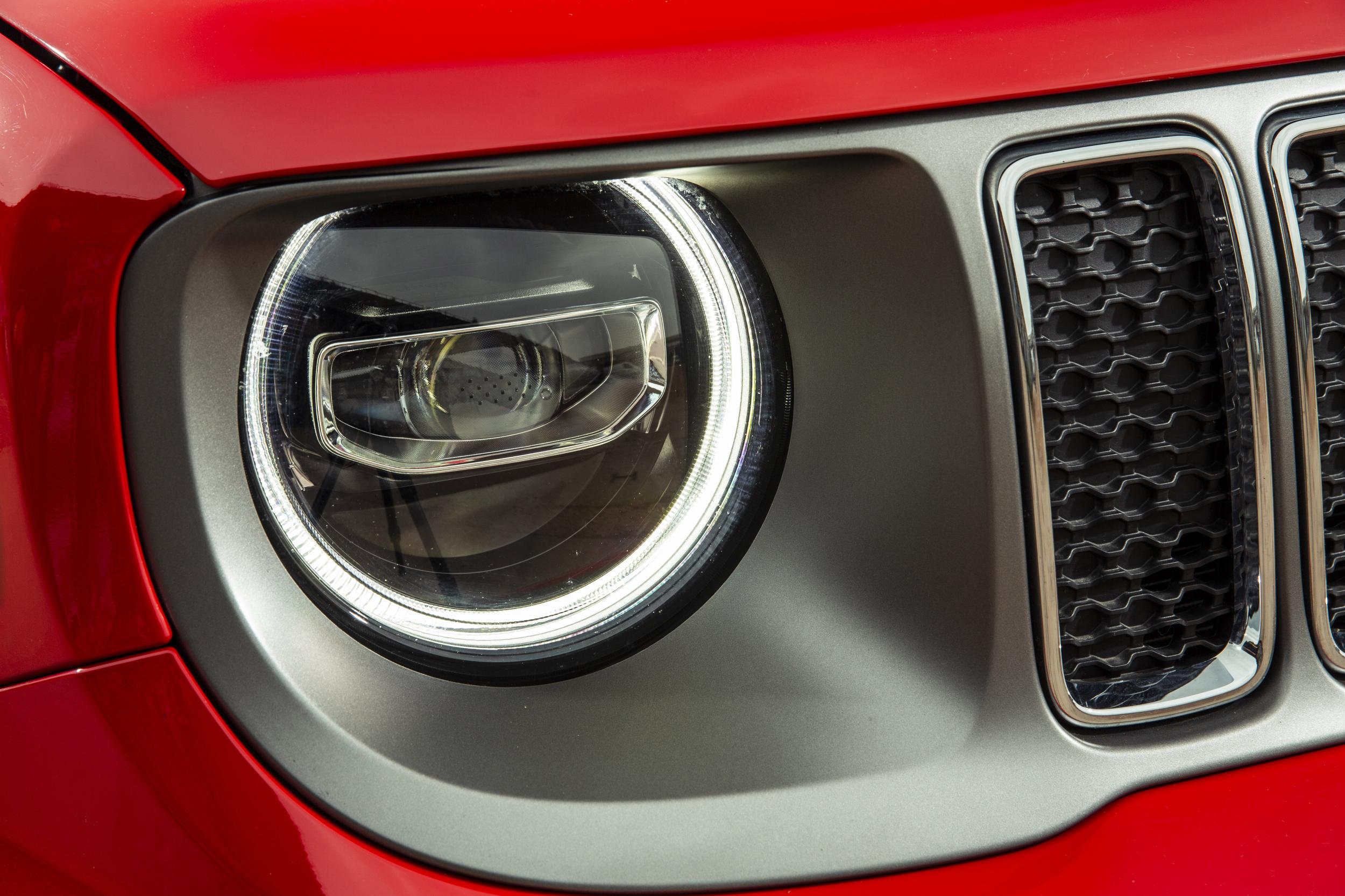 The treatment of the traditional Jeep seven-slat grille and the car’s face is especially attractive