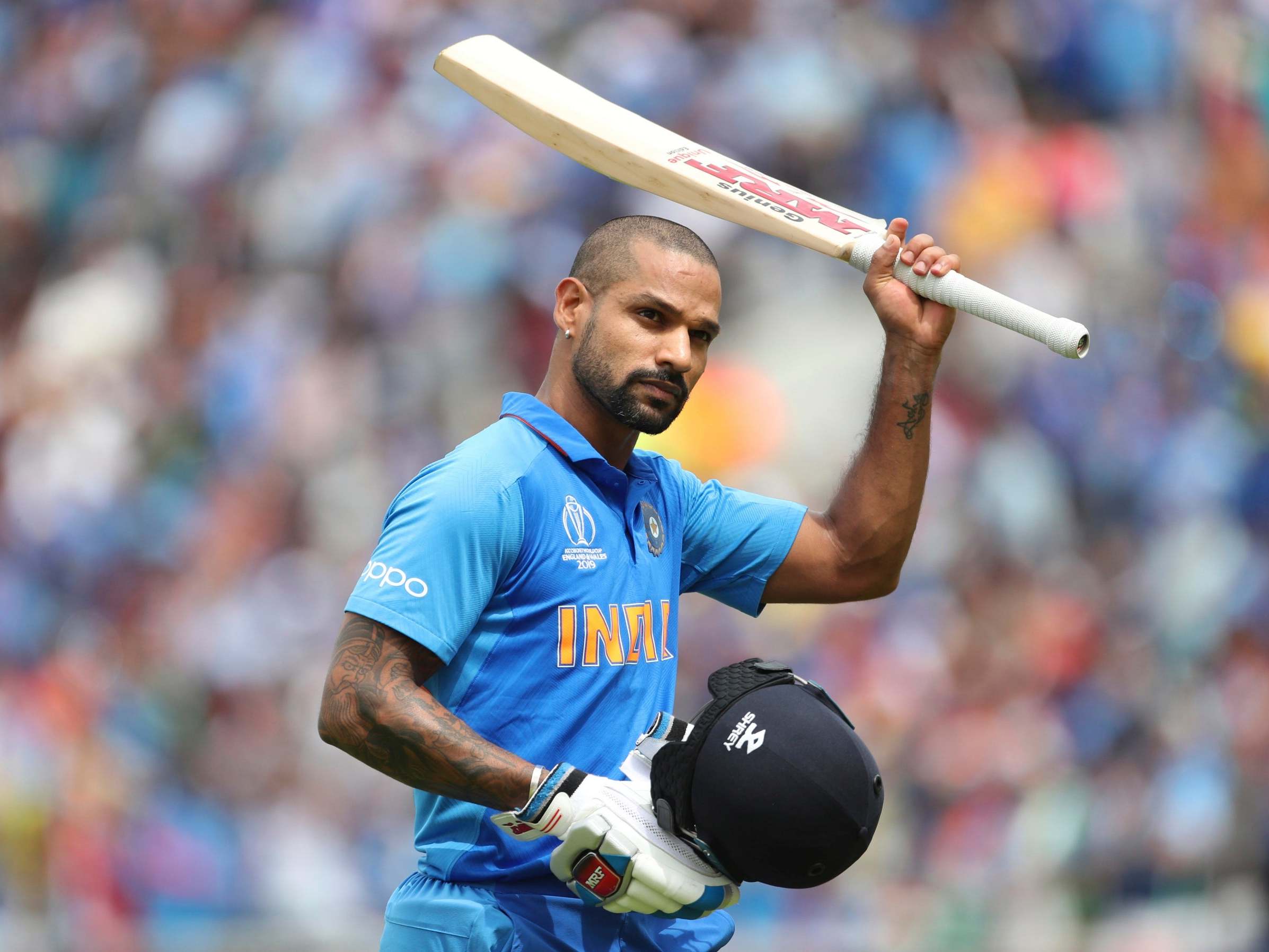 Dhawan celebrates scoring a century