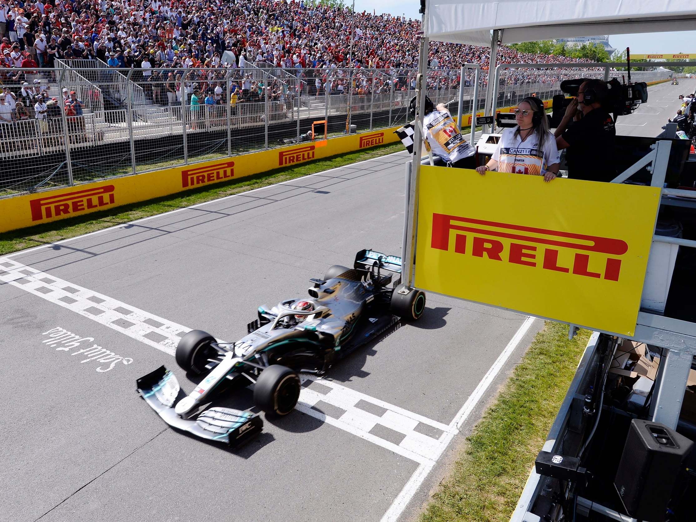 Lewis Hamilton crosses the line