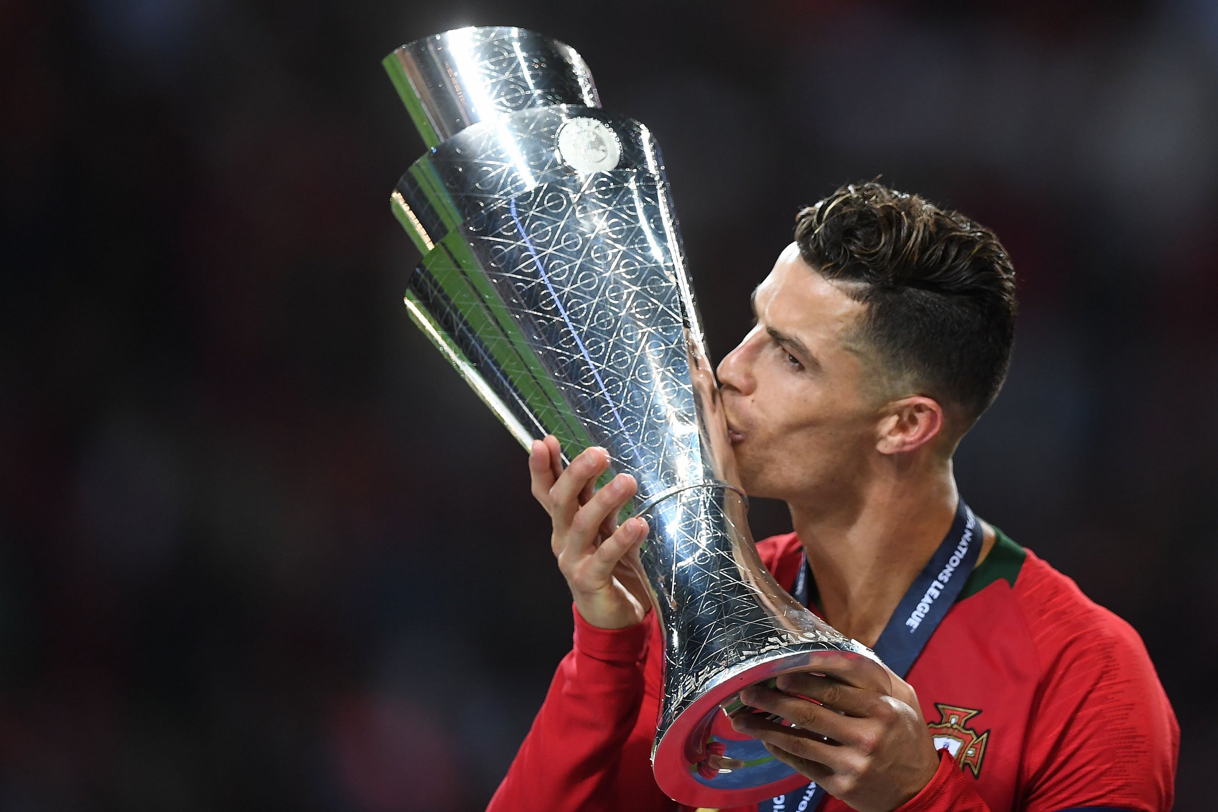 Ronaldo celebrates with the trophy (AFP/Getty)