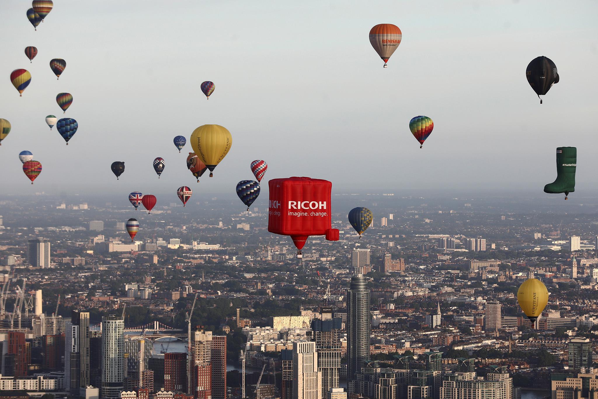 Hot air balloons fly over London as a part of the Lord Mayor's Hot Air Balloon Regatta in London in 2019