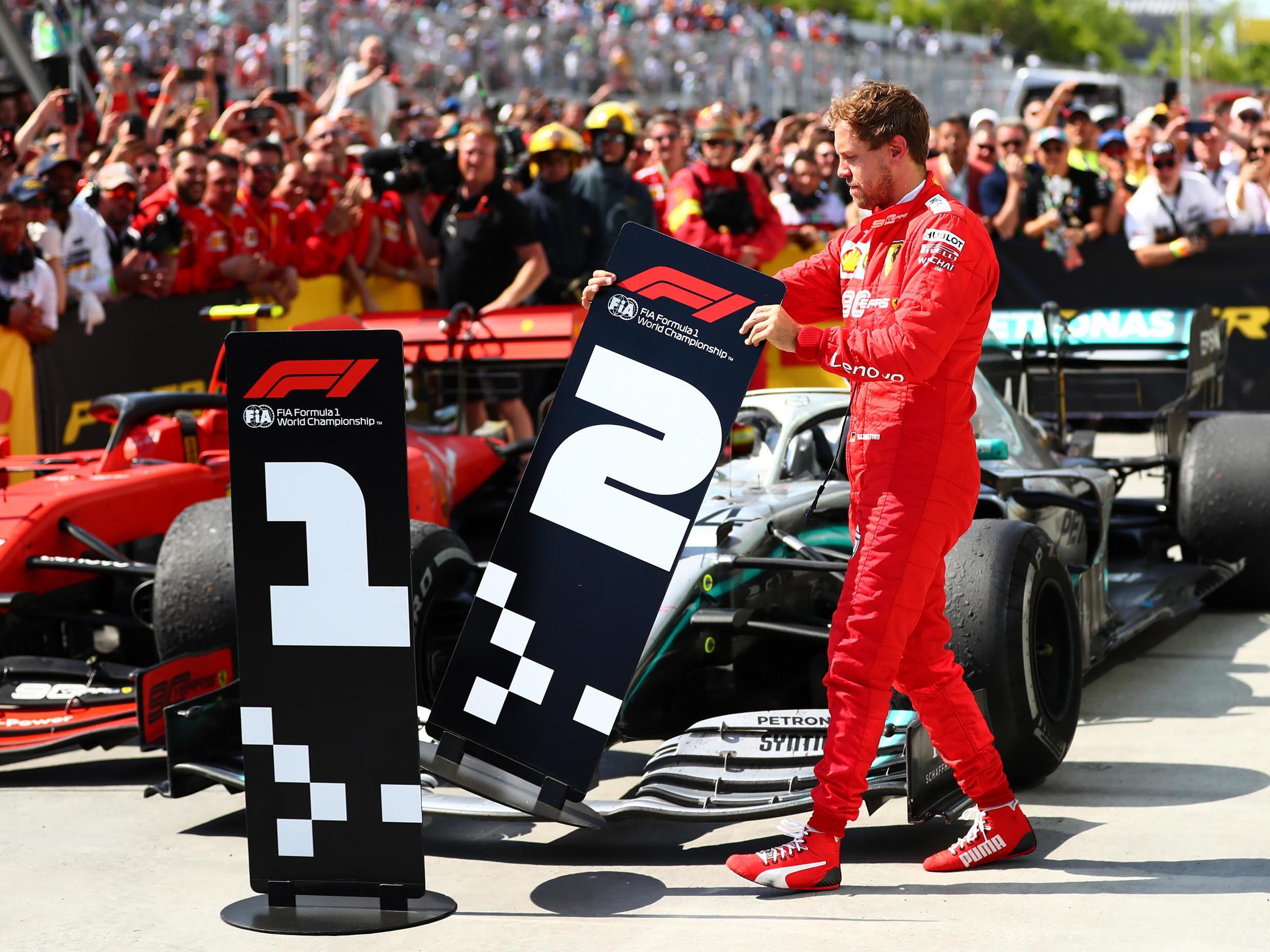 Vettel swaps the finishing placards at the end of the race