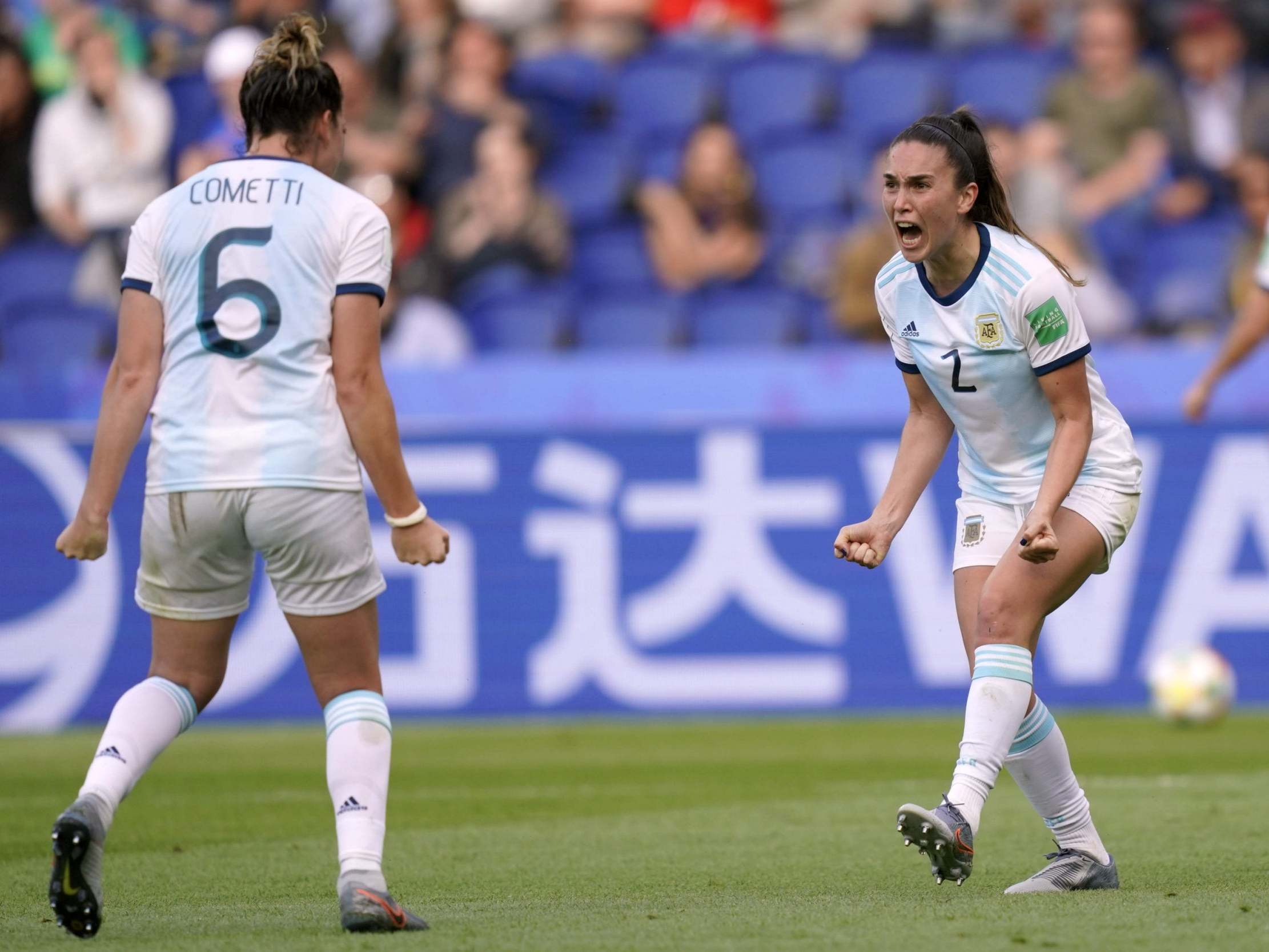 Argentina defenders Agustina Barroso, right, and Aldana Cometti celebrate