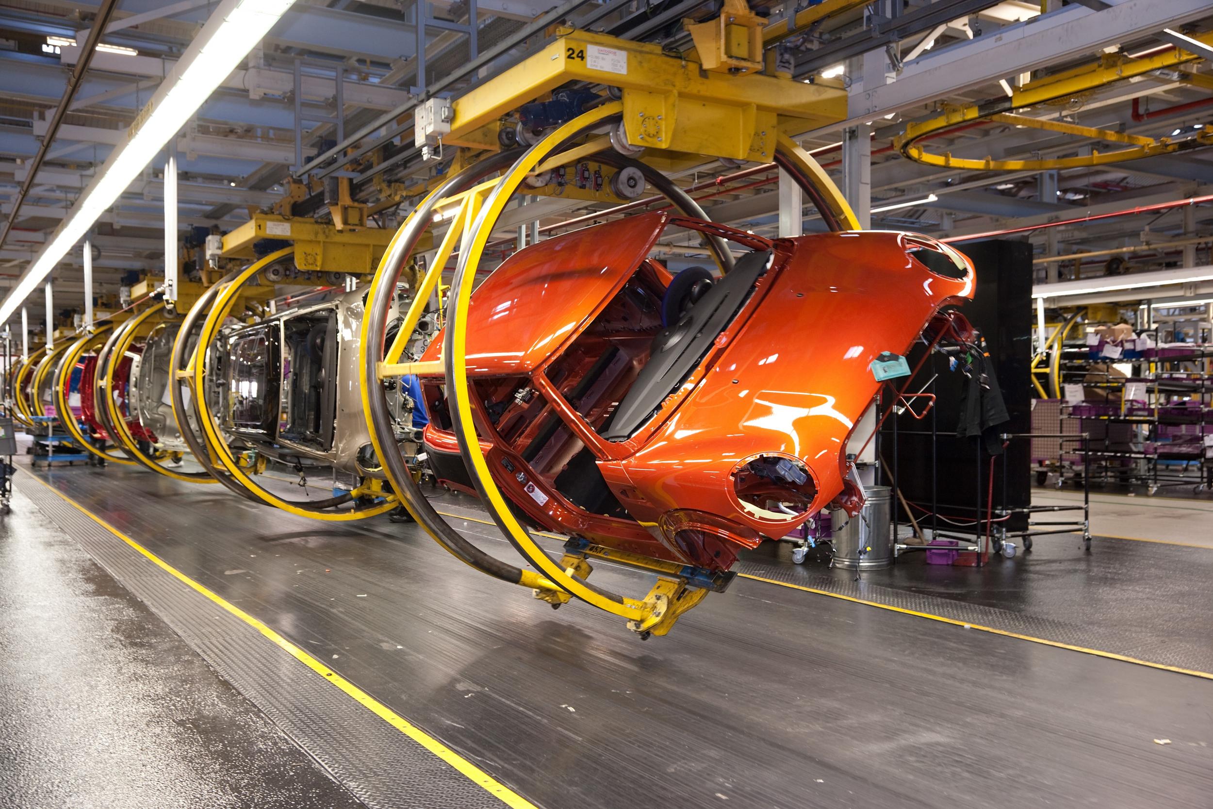 An early example of the new Mini is made at the factory at Cowley, Oxford