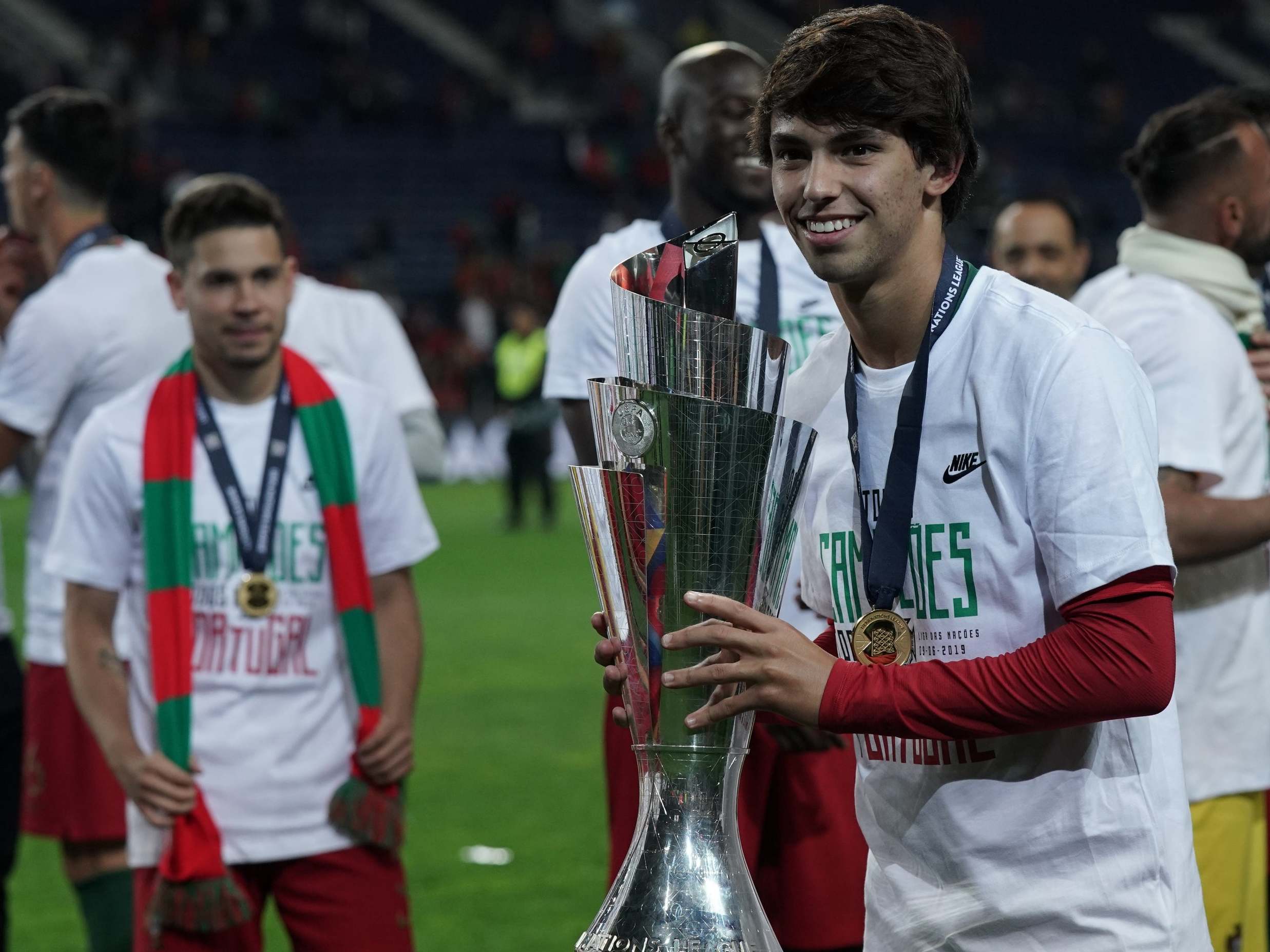 Joao Felix celebrates with the Nations League trophy