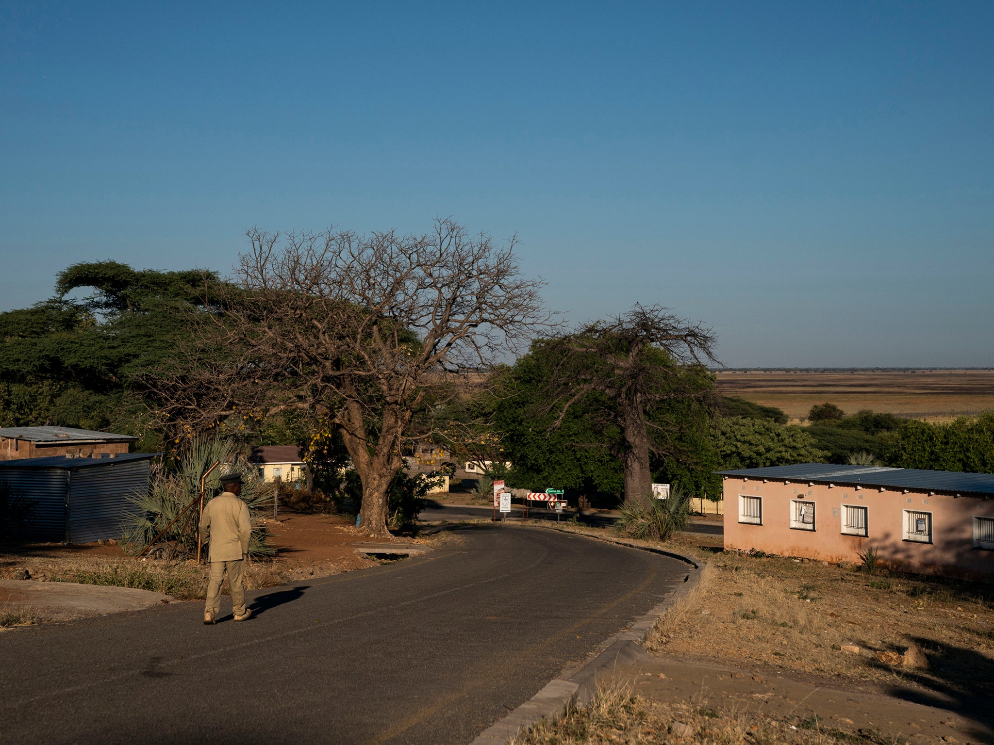 A man walks through the Kavimba village in the Chobe Enclave, Botswana