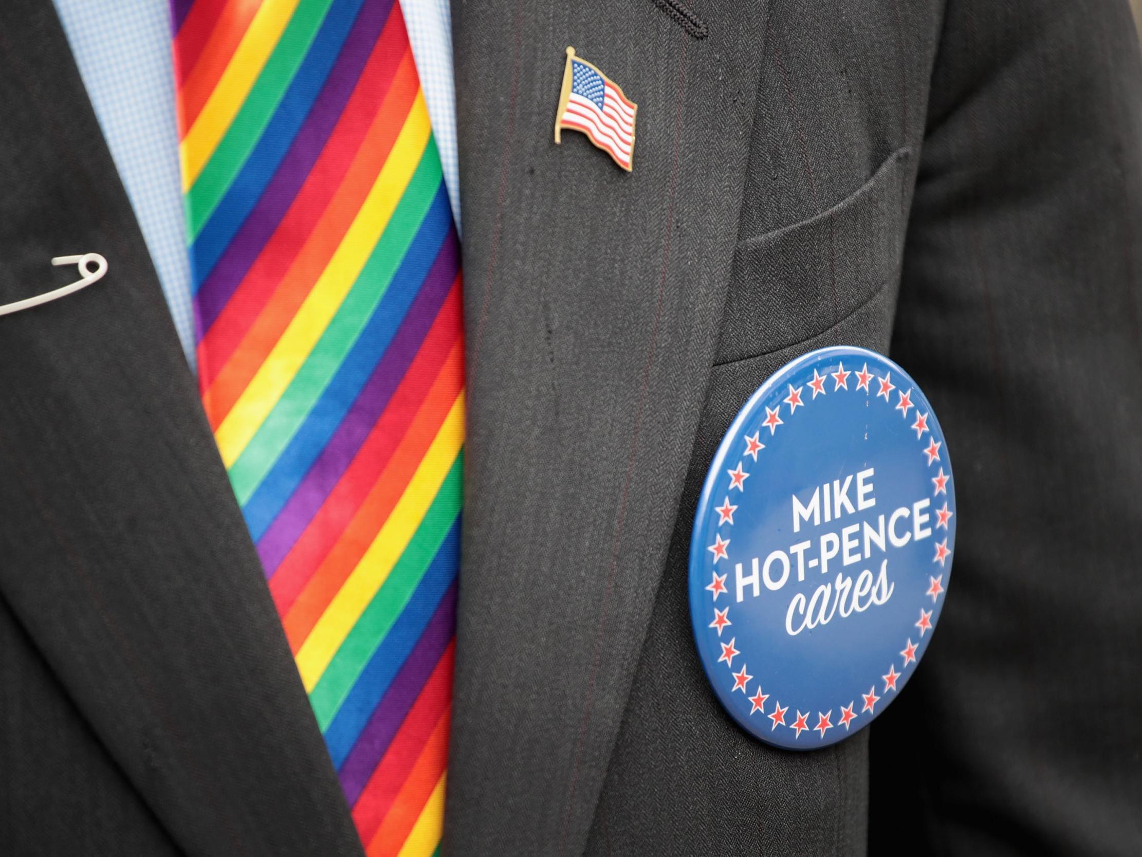 Mike Pence (represented above by look-alike Mike-Hot-Pence) has defended US government's decision to bar rainbow flags outside US embassies