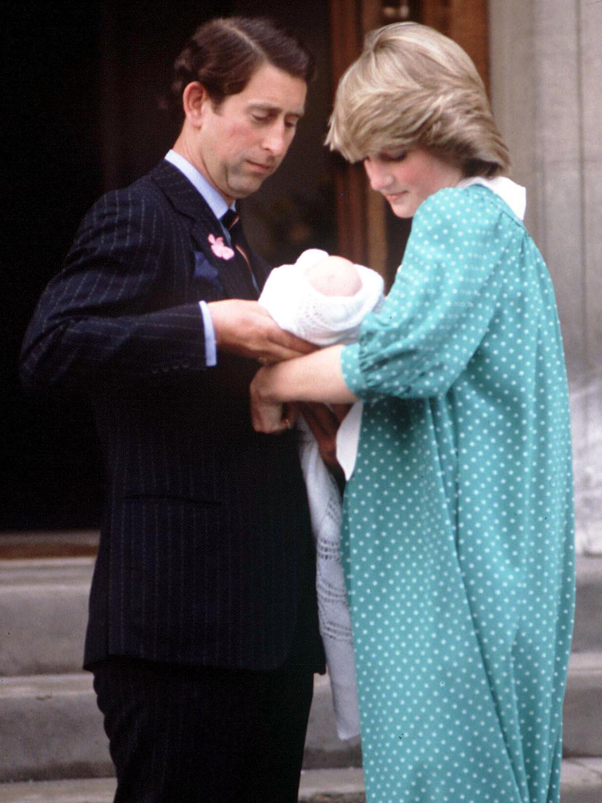 Diana, Princess of Wales, with her husband and first son William in 1982