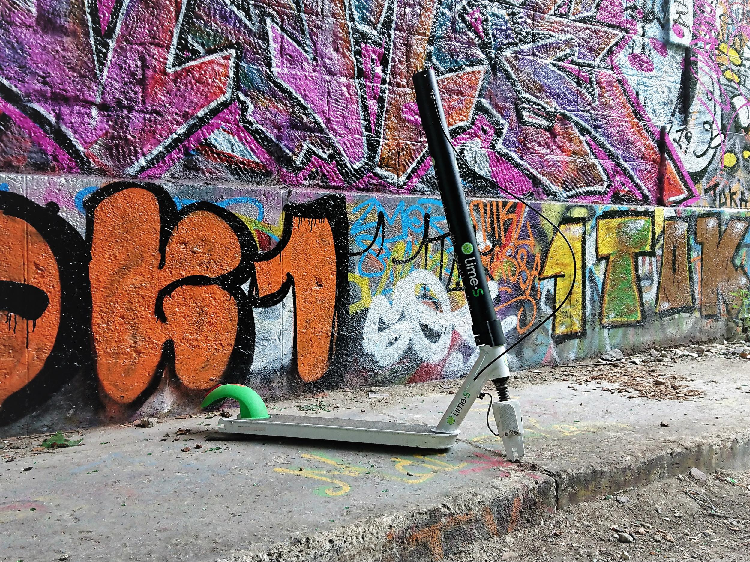 An abandoned Lime scooter left in a Paris railway tunnel