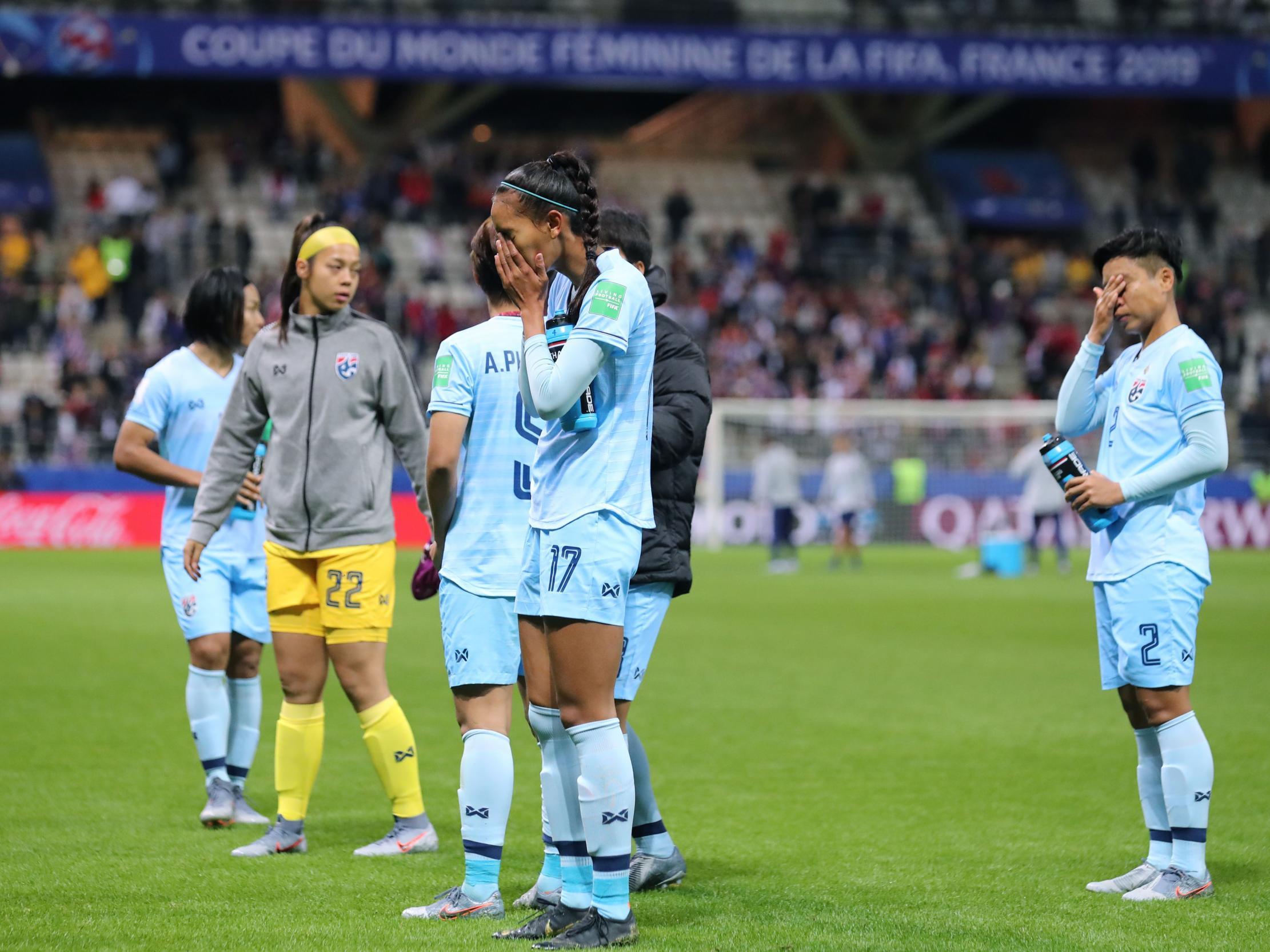 Thailand's players react after their defeat at the hands of the USA