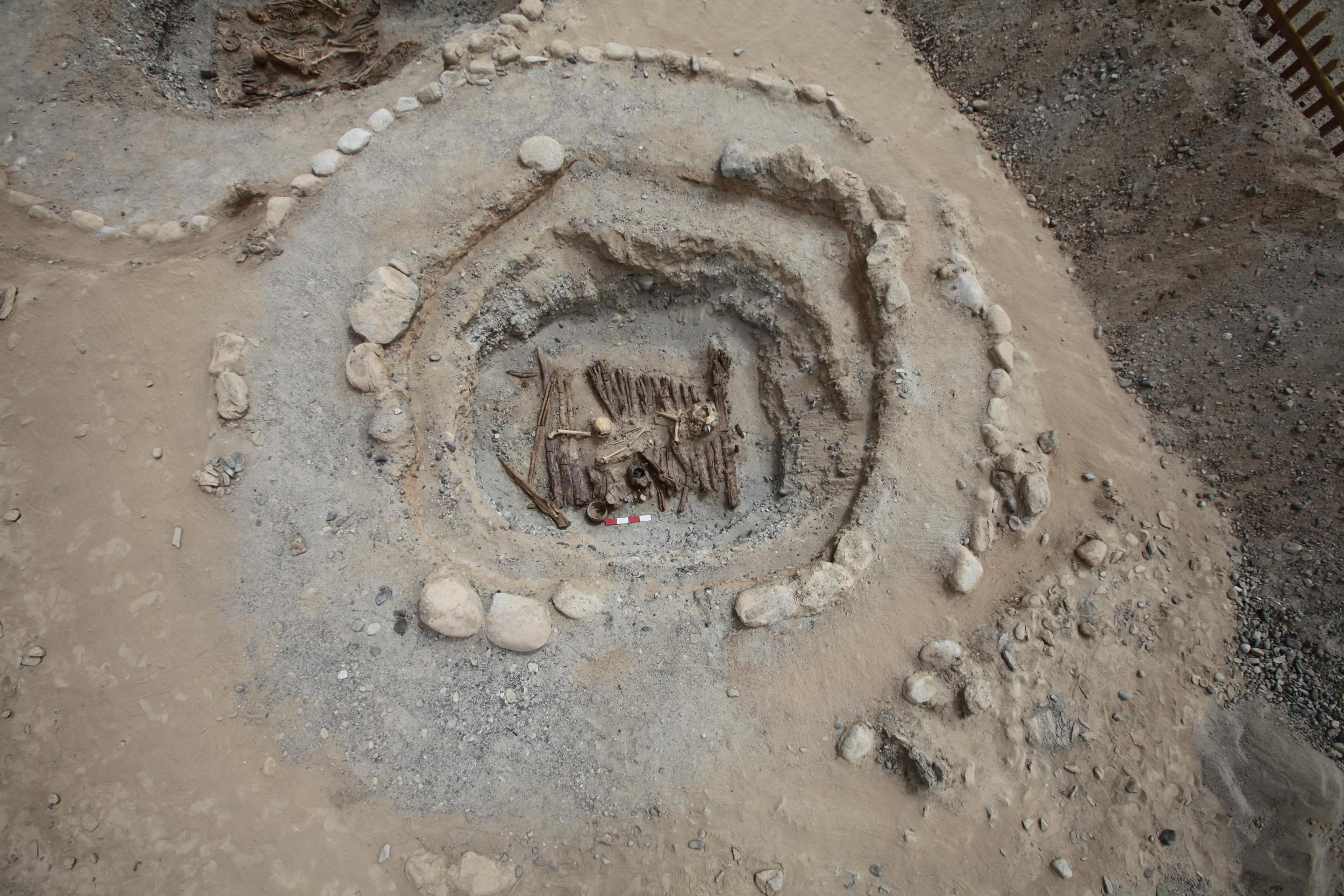 The incense burner in one of the tombs can be seen at the middle bottom edge of the central circle