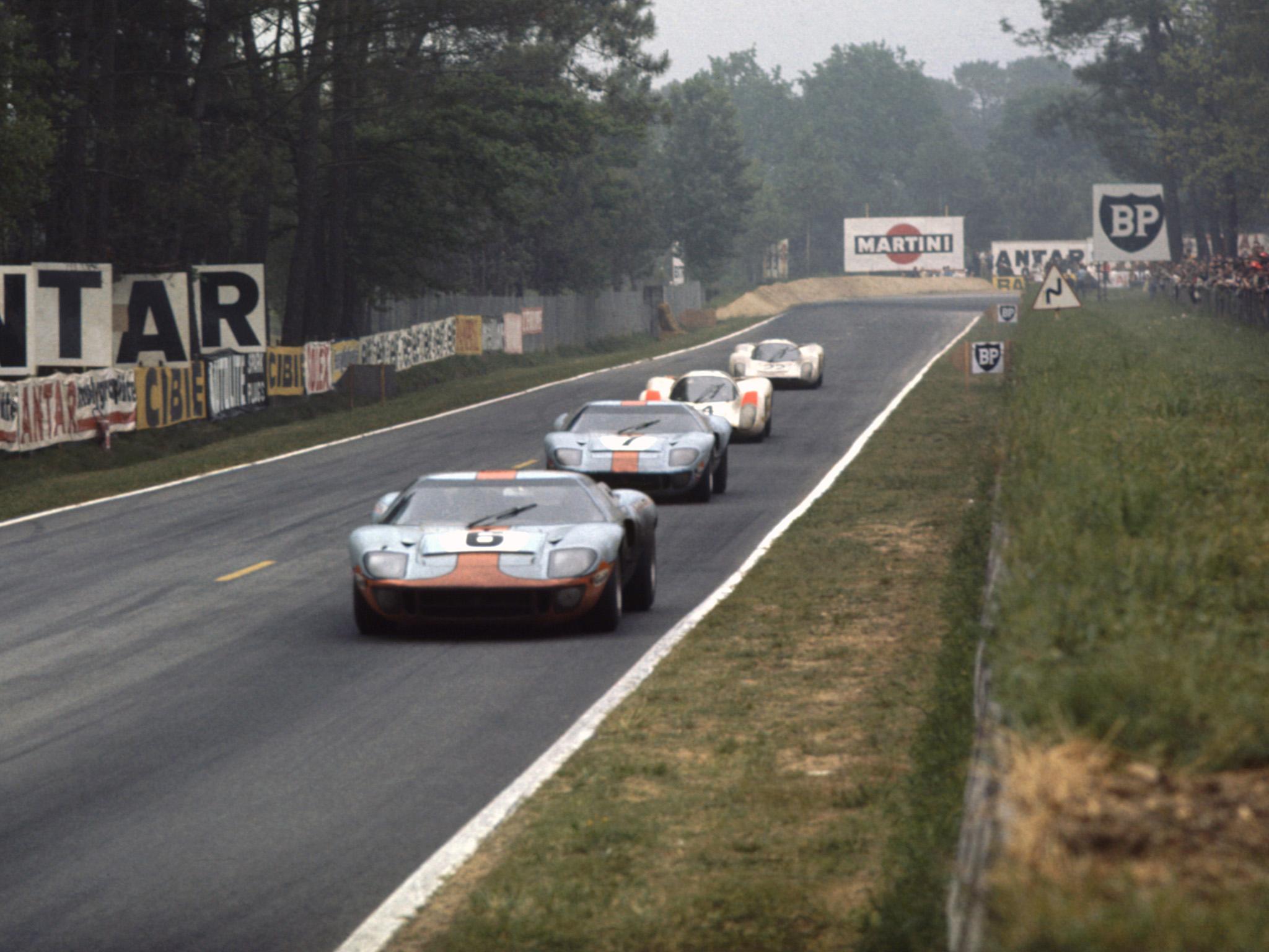 Le Mans, 1969: Jacky Ickx (Ford GT40) leads David Hobbs (Ford GT40) in 2nd position, with Hans Herrmann (Porsche 908) in 3rd position