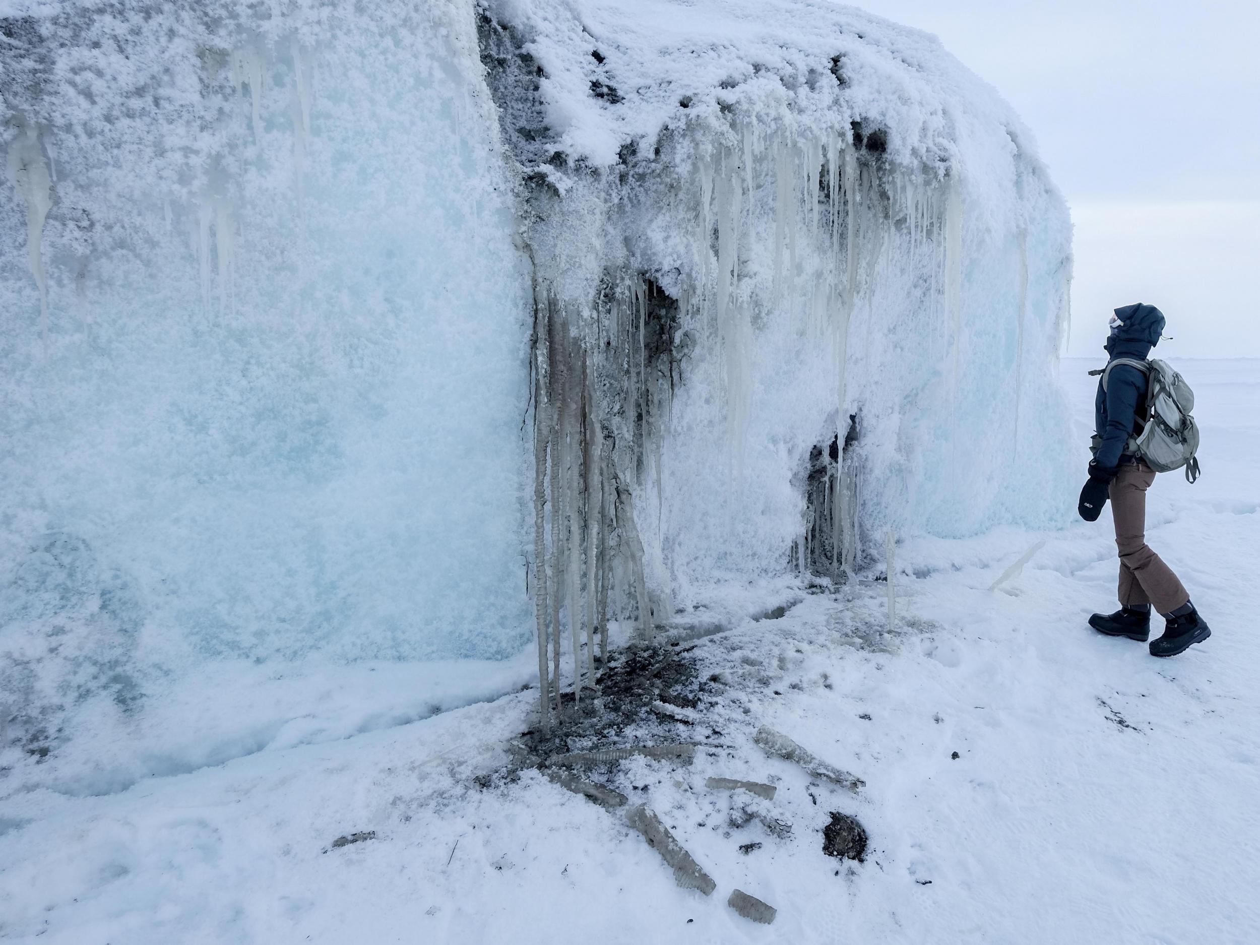 Melinda Webster examines a fragment of multiyear ice