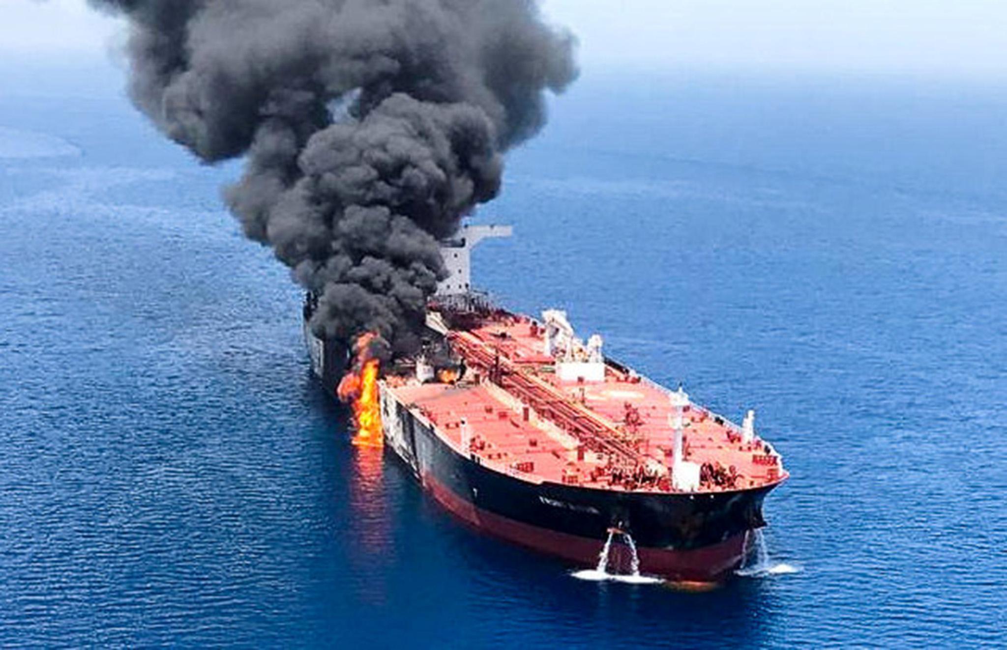 Smoke billows from one of the tankers that was attacked