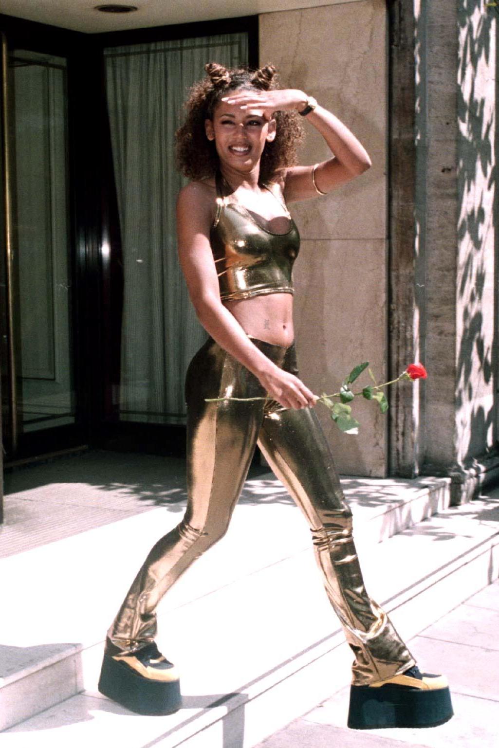 Mel B rocking her gold metallic flares (Rex)