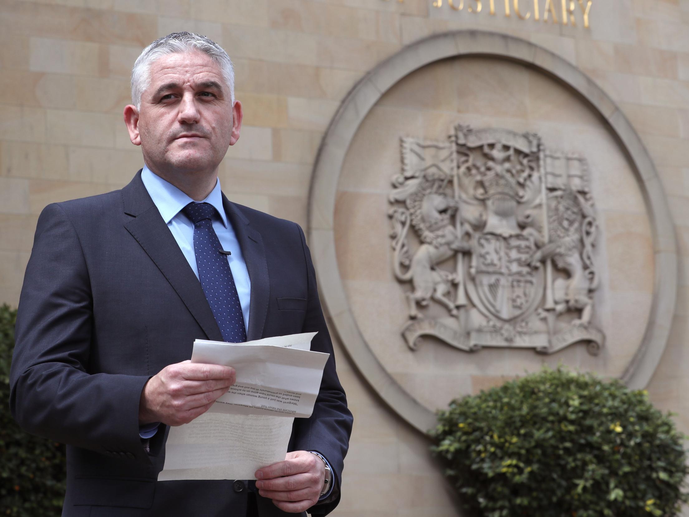 Senior investigating officer Detective Superintendent Paul Livingstone gives a statement outside court (PA)