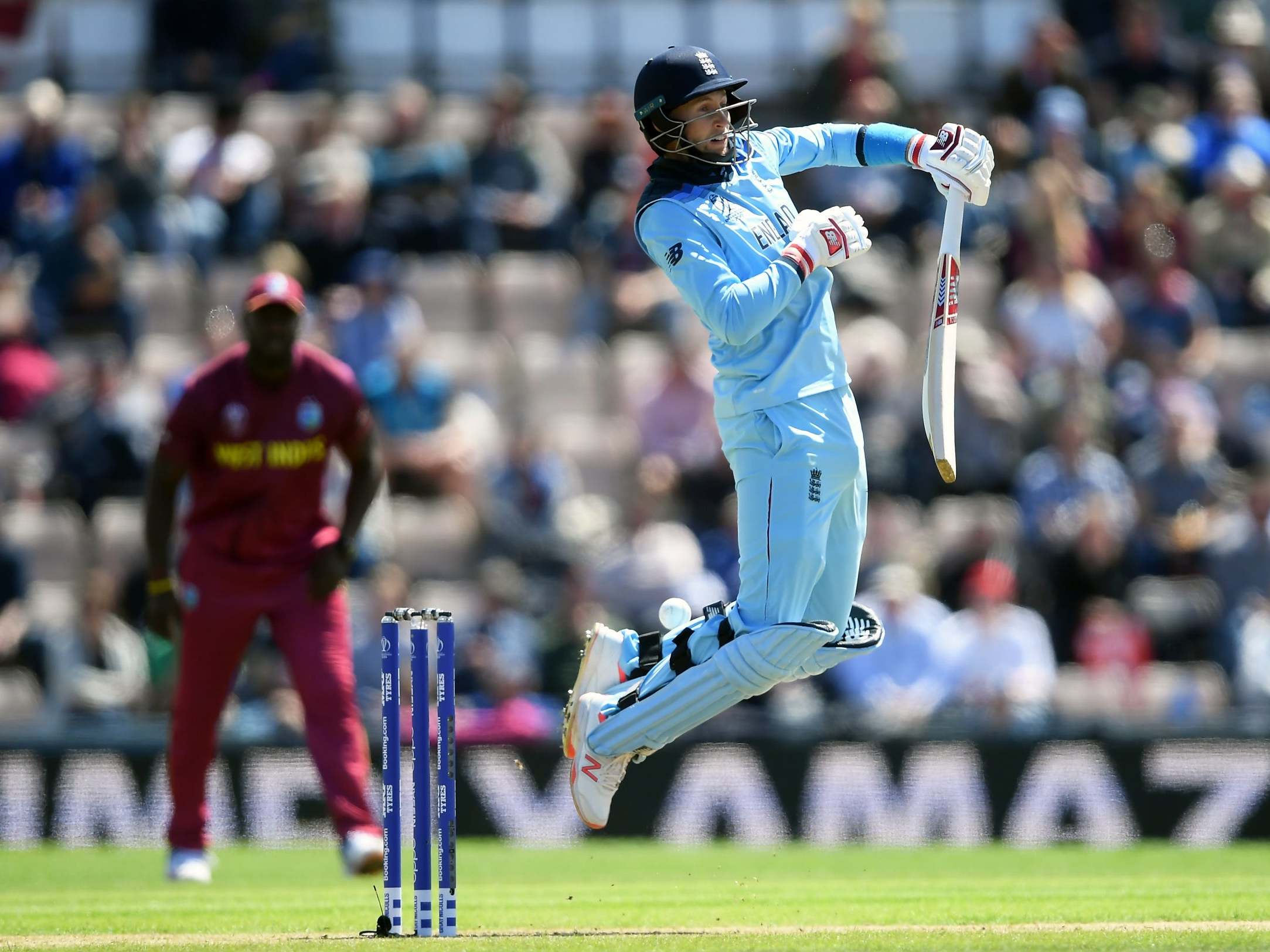 Joe Root defends against a bouncer