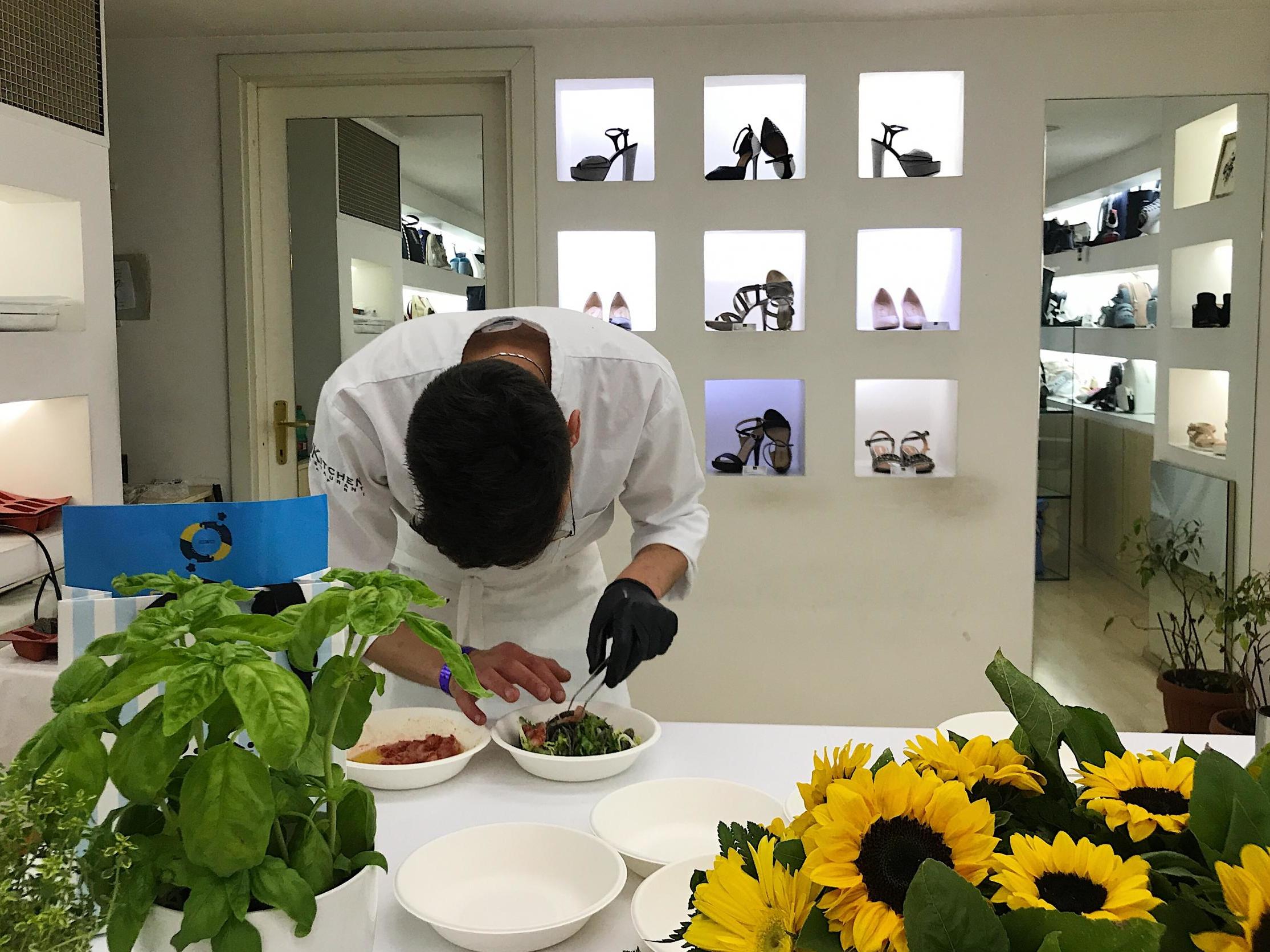 Sole food? A chef prepares marinated red prawn in a shoe shop in Vico Equense