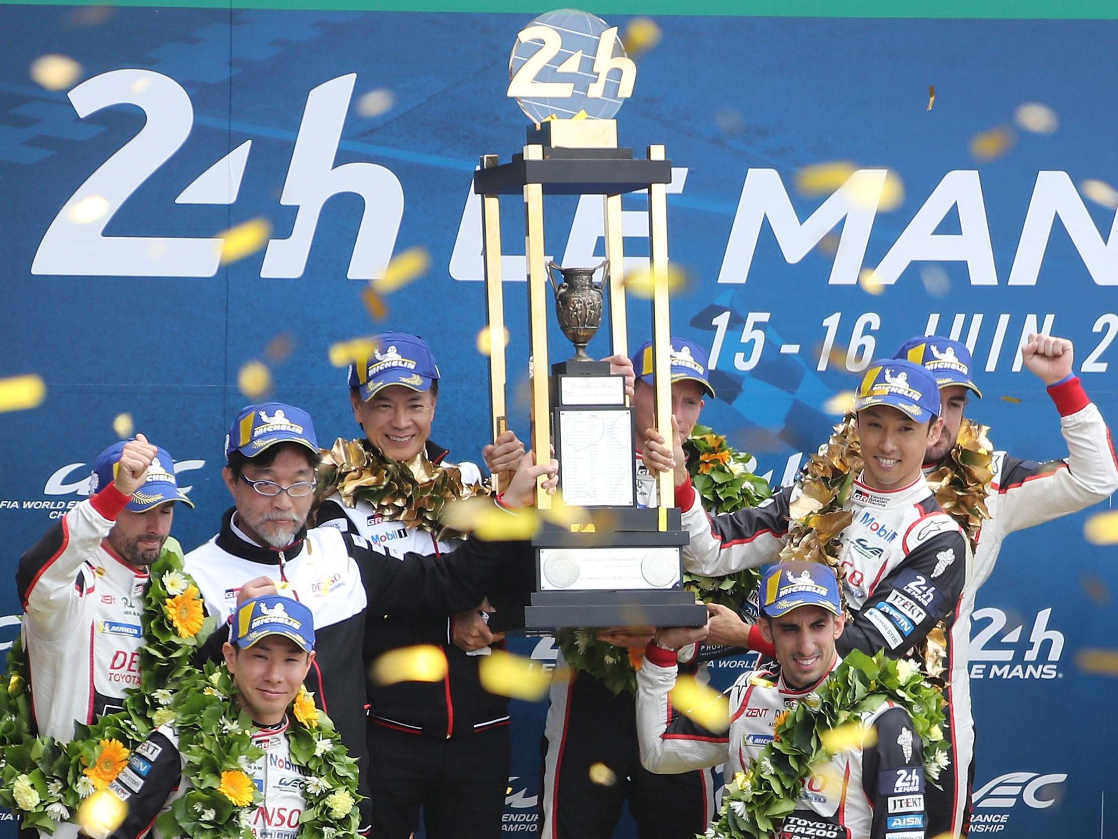 Toyota’s two teams celebrate winning their one-two finish in the Le Mans 24 Hours