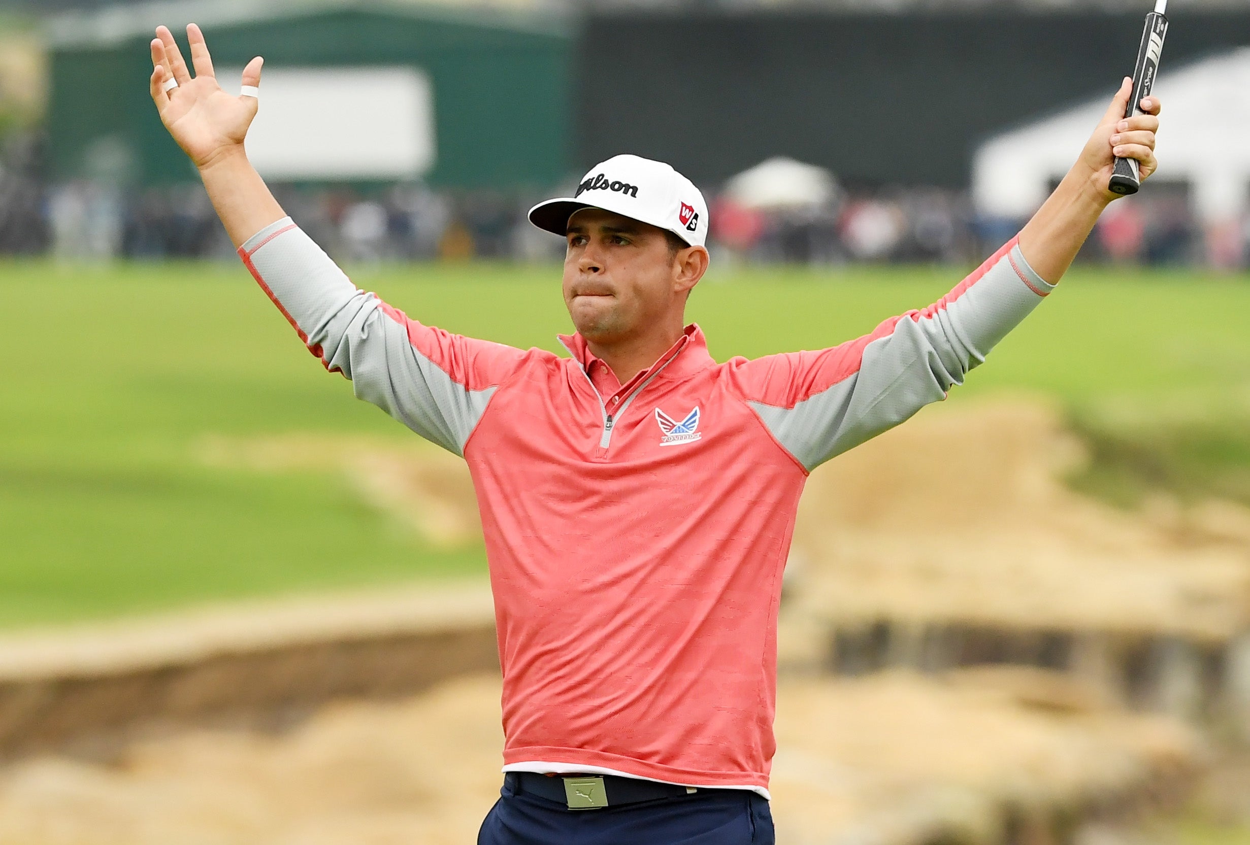 Woodland celebrates his winning putt