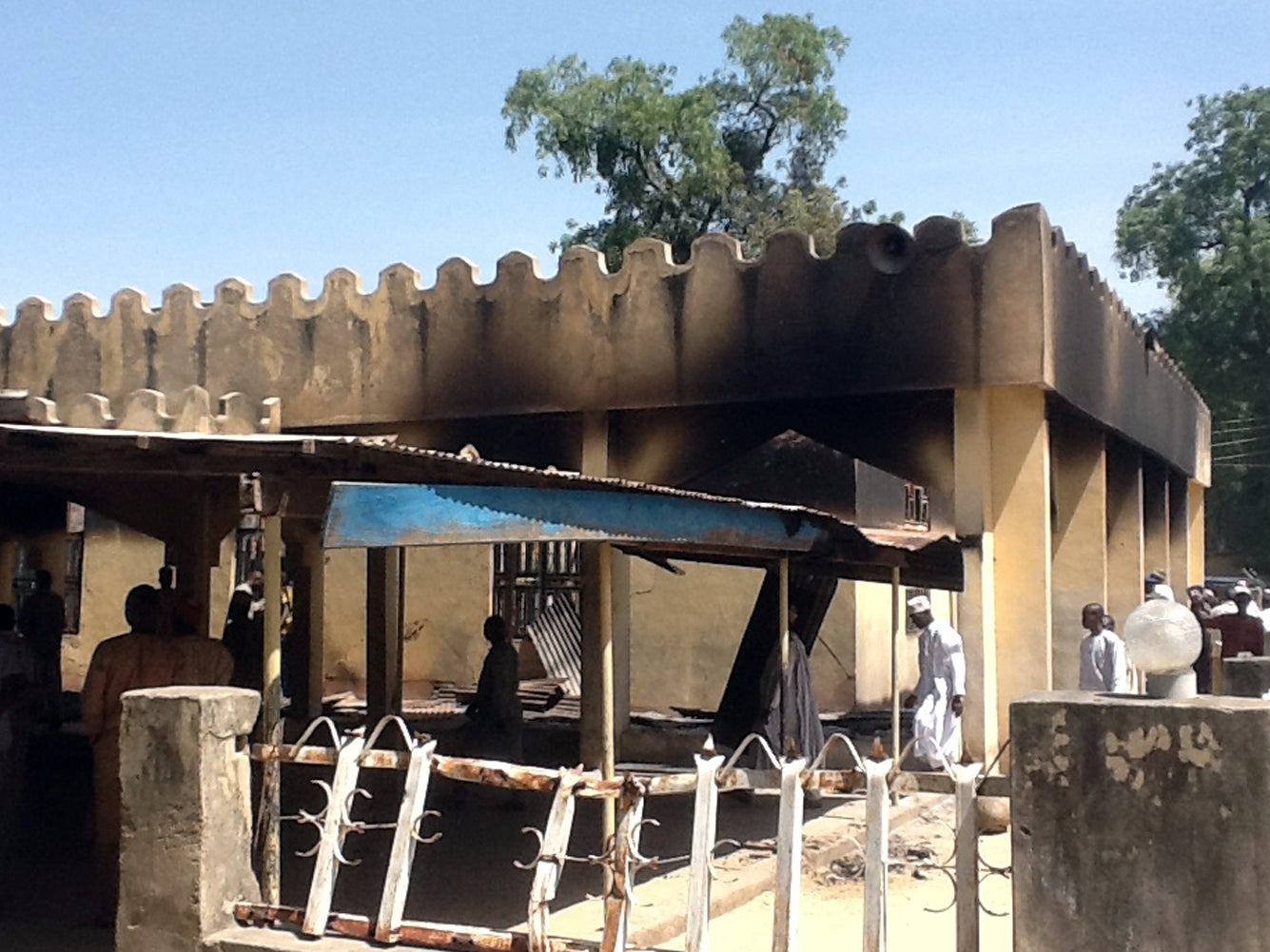 People in Konduga following a 2014 bombing. The village has been attacked multiple times