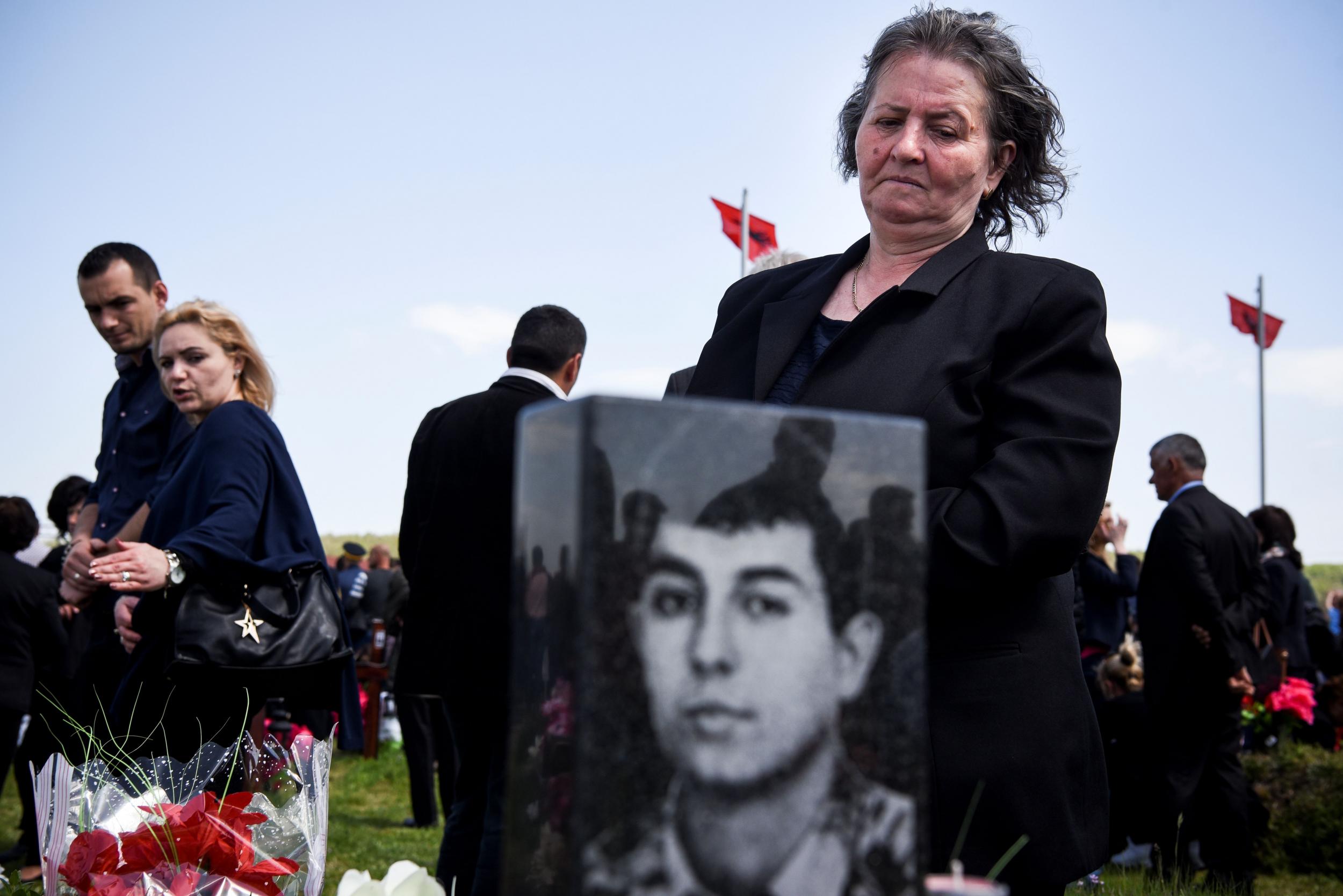 Kosovars pay respect for their relatives killed during Gjakova massacre (Armend Nimani/AFP/Getty)