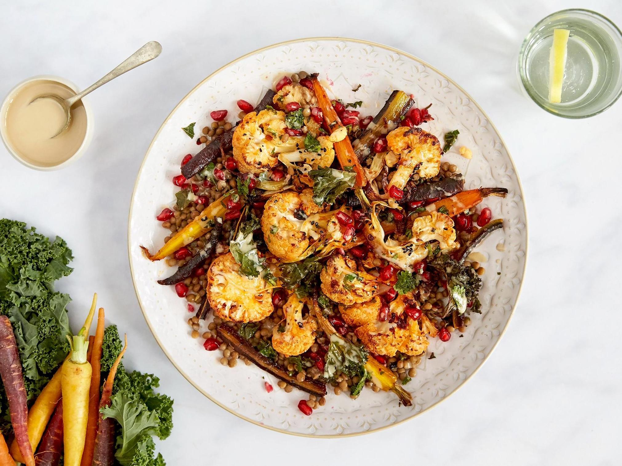 Pomegranate seeds and minty lentils make a herby-sweet base for the roasted veg