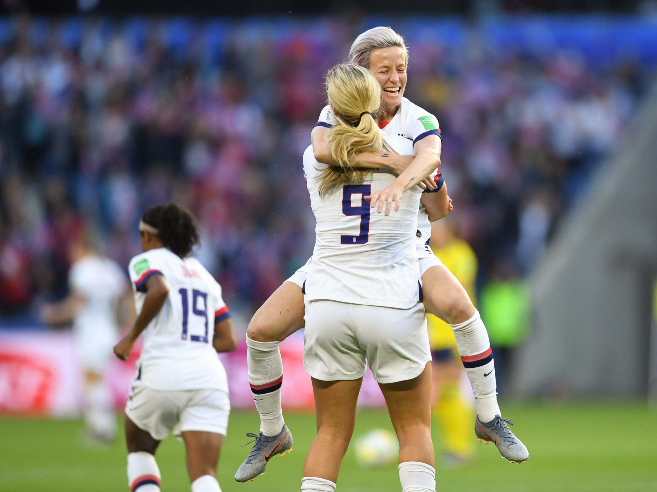 The US celebrate defeated Sweden 2-0 in their final group game