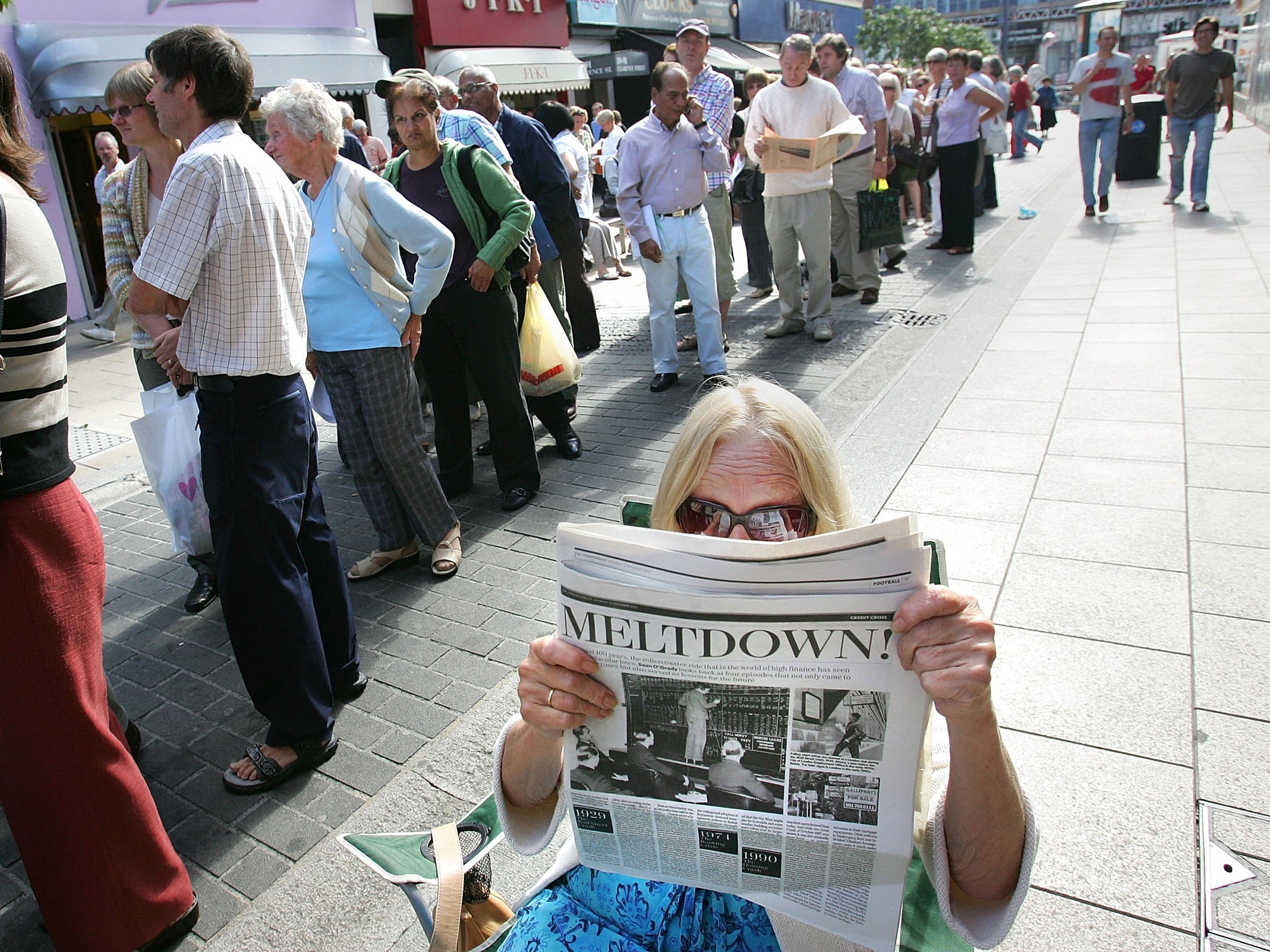 The first run on a British bank in 150 years: Northern Rock customers queue to get out their cash in 2007