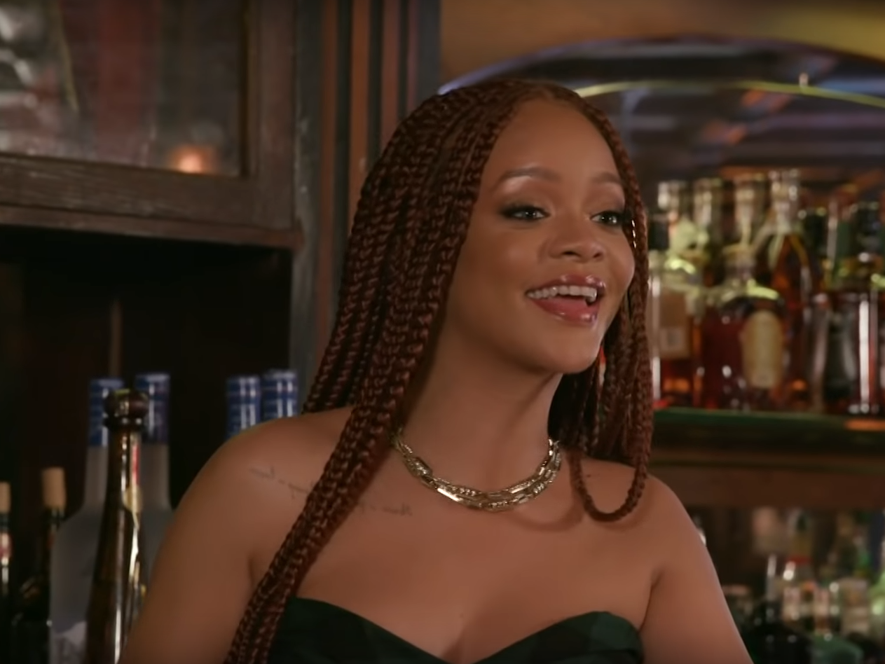 Rihanna goes behind the bar during the late night talk show segment