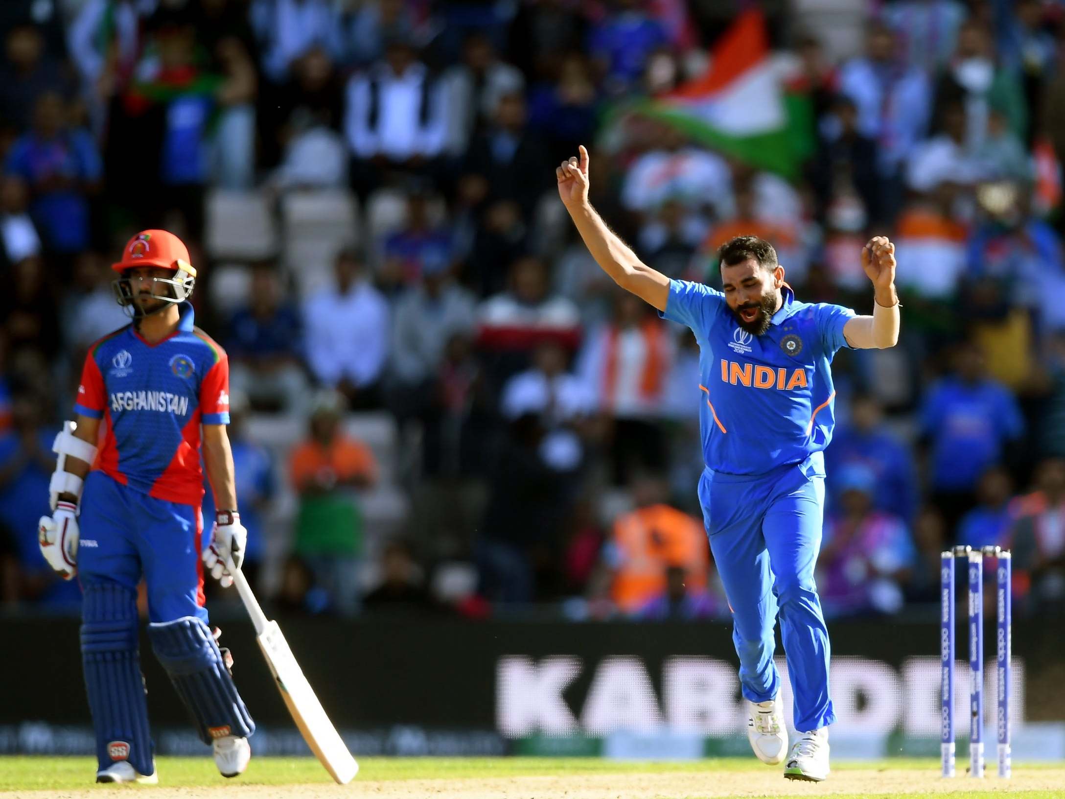 Mohammed Shami celebrates the wicket of Mujeeb Ur Rahman