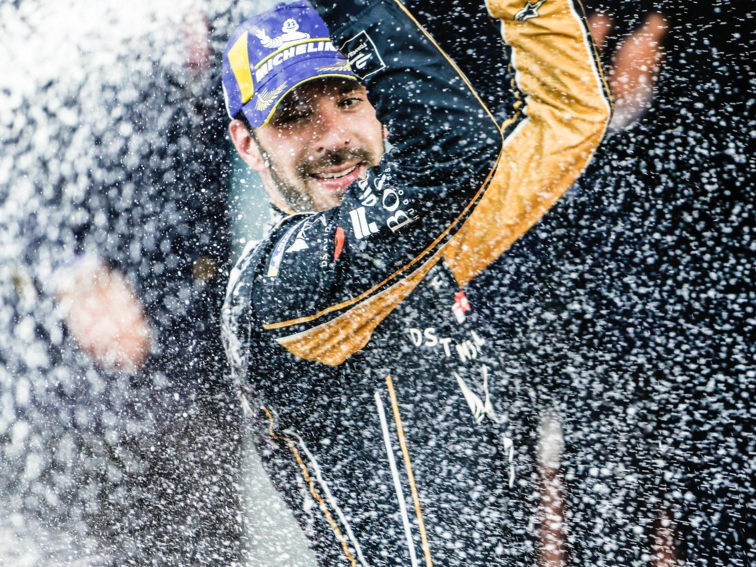 Jean-Eric Vergne celebrates his win on the podium