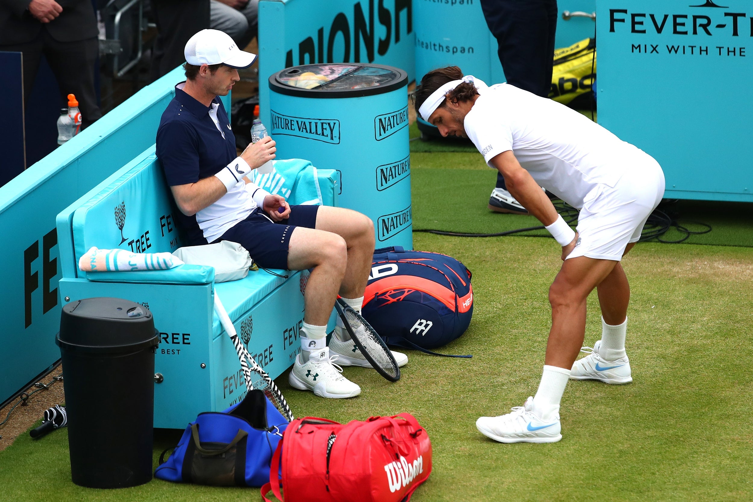 The pair discuss tactics mid-game