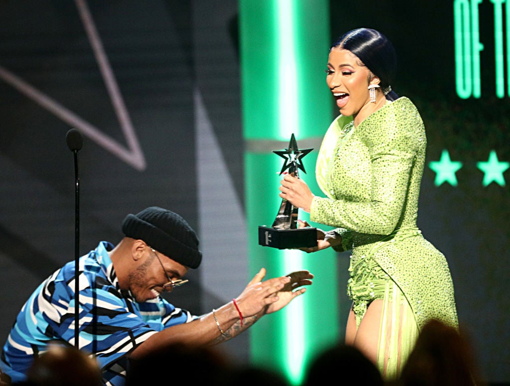 Anderson .Paak presents Cardi B with the award for Album of the Year