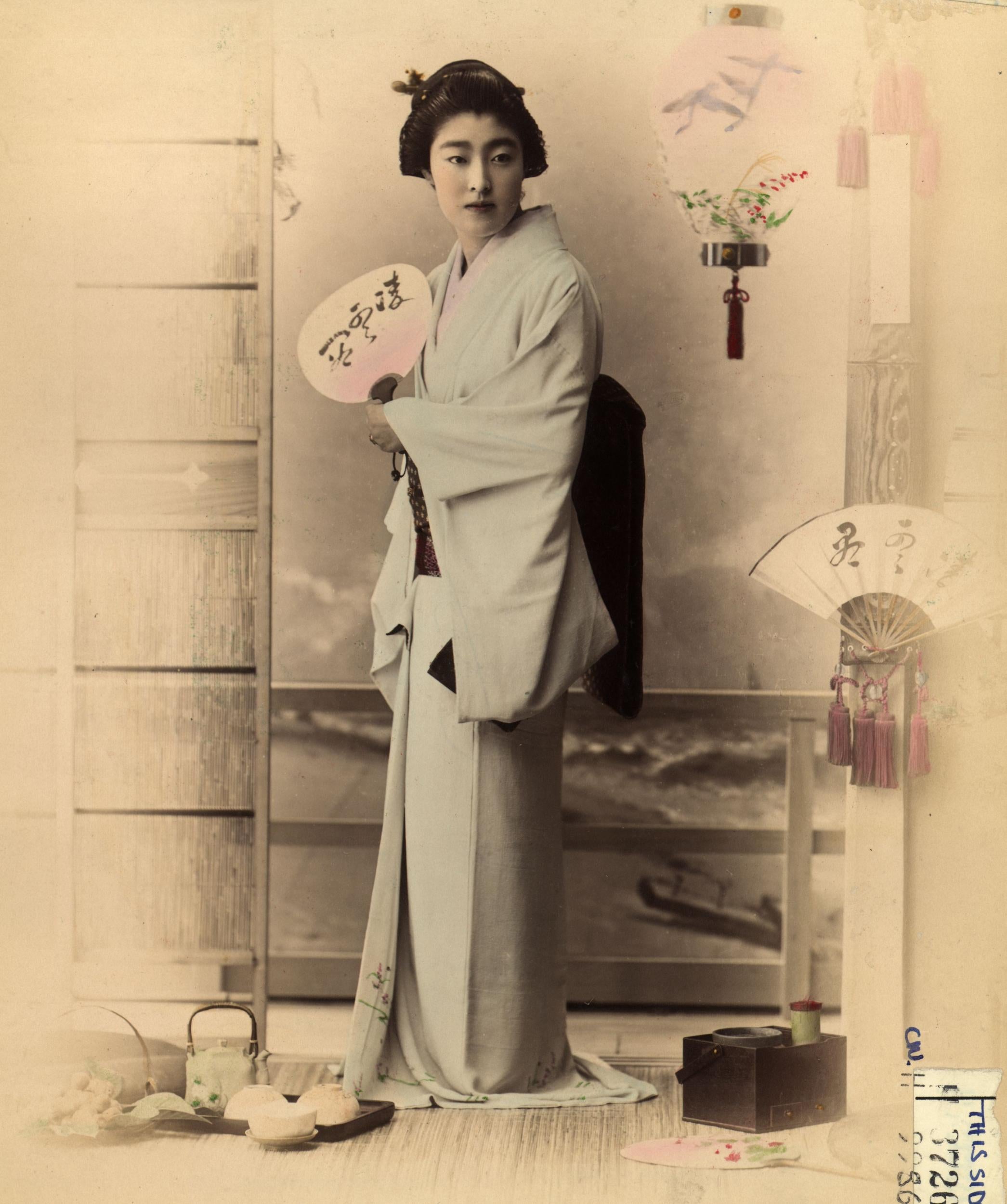 A Japanese woman in a kimono, circa 1900